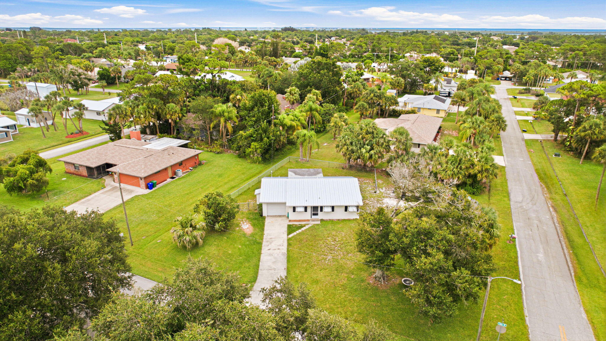 Searching for a smaller home on a larger piece of land with no HOA restrictions? This 2-bed, 2-bath CBS home on Easy St is your perfect match. Offering 944 sq. ft. of bright interior space, a large back porch, and a sturdy metal roof, the heavy lifting is done. The real showstopper is the oversized 1/3-acre lot, giving you onsite RV and boat parking that's getting harder to find on the coast. Centrally located in Sebastian, you're just a short drive from the Indian River Lagoon, boat ramps, shopping and restaurants. Secure your piece of Florida paradise before someone else does!
