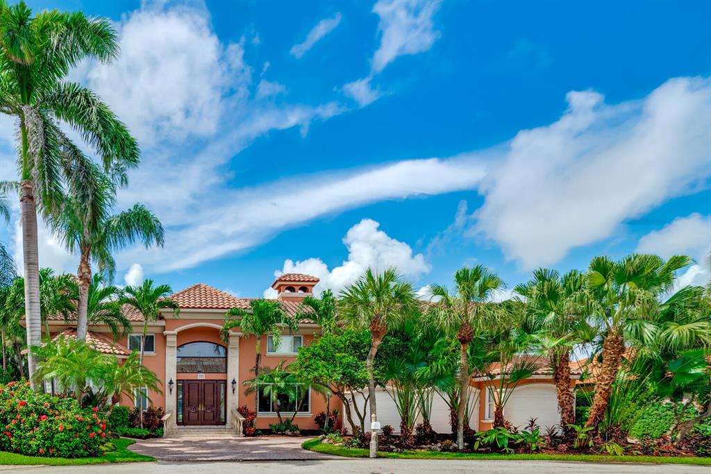 RARELY AVAILABLE RESIDENCE ON 124 FEET OF COVETED WATERFRONT WITH FABULOUS TROPICAL INTRACOASTAL VIEWS FROM ALL MAIN LIVING AREAS. RELAX IN THE SPARKLING POOL OR SPA ENJOYING THE OCEAN BREEZES AND SUNNY FLORIDA SOUTH EXPOSURE WHILE WATCHING THE BOATS GO BY.   USE THE 16,000 lb BOAT LIFT WITH ALSO ROOM FOR YOUR OTHER WATER TOYS AND YOUR YACHT. 110 FOOT  WIDE CANAL! WITH SOUTH EXPOSURE. THE LARGE MASTER SUITE IS ON THE FIRST FLOOR WITH OPEN WATER VIEWS. TRAVERTINE MARBLE FLOORING THROUGH OUT LIVING SPACES. 
THE EAST DELRAY LOCATION OFFERS  EASY ACCESS AWARD WINNING BEACHES, POPULAR DINING AND SHOPPING DISTRICTS OF ATLANTIC AVENUE.  
SEE ATTACHED FLOOR & SITE PLAN. 340+  A/C  SQ FT ARE NOT REFLECTED ON TAX ROLLS. Most Room Photos are Virtualy Staged