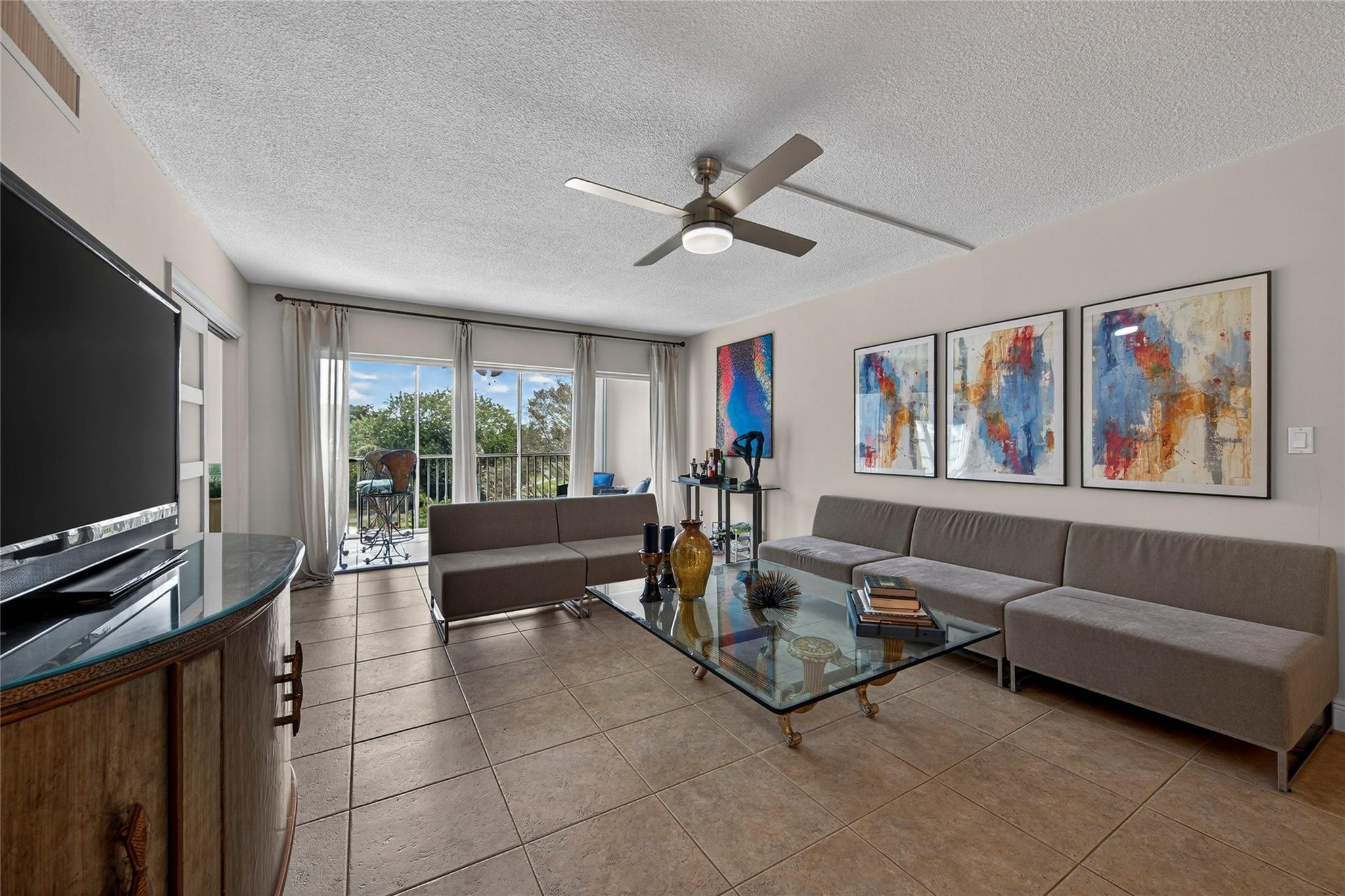 Fantastic Opportunity to own in Palm Aire County Club Condos! This recently updated 2 bedroom, 2 bath condo on the fifth floor has spectacular views overlooking the golf course AND it's being sold completely furnished! The updated kitchen features Samsung appliances, solid wood cabinets and Granite countertops. Tile floors and a screened-in balcony to enjoy the views. We priced this unit below market value and the sellers are ready to move. Pack your bags and move right in! You can't rent the first 2 years and pets are not allowed. But the pool is next door and there's plenty of parking. Come see this great unit! You'll want to call it home!