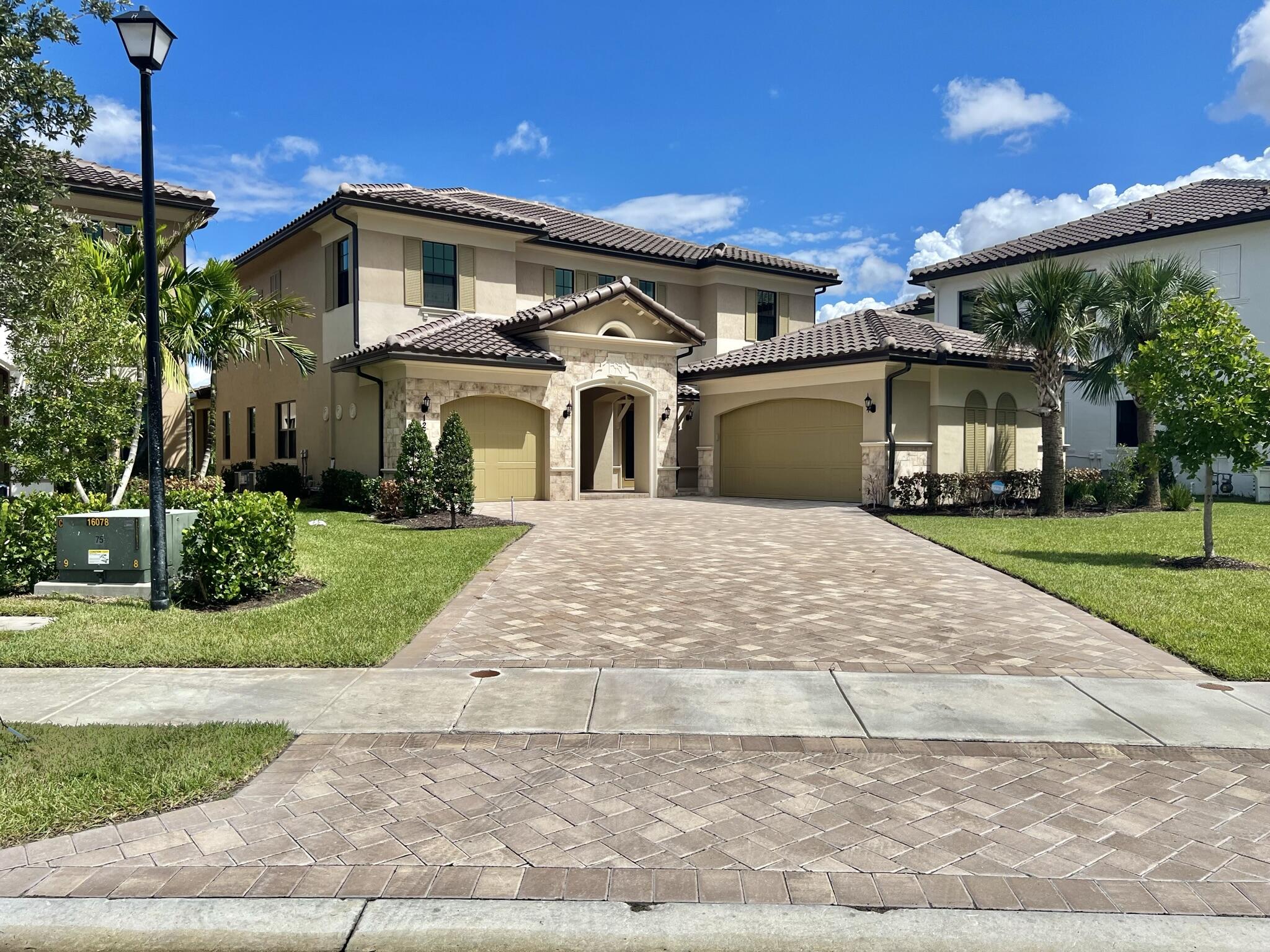 Highly sought-after Sycamore model featuring 5 bedrooms, 5.5 bathrooms, a gourmet kitchen with a large island, stainless-steel appliances, quartz countertops, contemporary cabinetry, and natural gas service. Additional highlights include 10-foot ceilings, 24" x 24" porcelain tile flooring, impact windows and doors, and a 3-car garage. Located on a low-traffic street with a huge green area in the backyard. Enjoy Parkland Bay's resort-style amenities, including a fitness center, tennis courts, pool with cabanas, children's playroom, and event rooms. Zoned for A-rated schools. Schedule a private showing today.