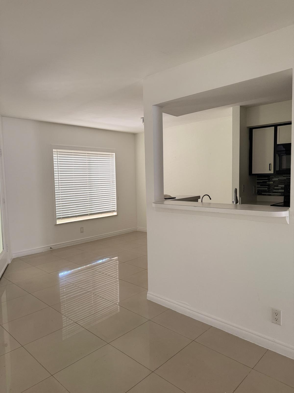 Fully renovated unit located in the heart of Boynton Beach with excellent access to I-95, offering a prime location close to everything. This beautifully updated home features a modern kitchen and bathrooms, tile flooring throughout, and stainless steel appliances. Enjoy a spacious private patio, perfect for relaxing or entertaining