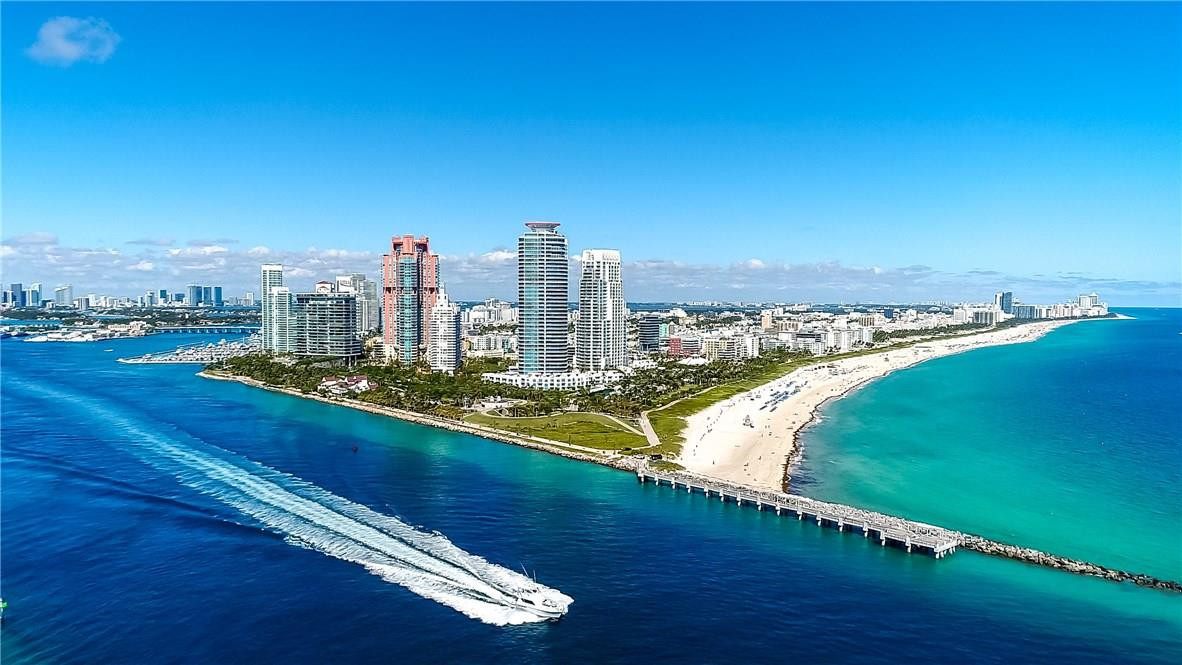Arguably,this NE corner unit has one of the most coveted views at the Continuum & all of South Beach! Enjoy sweeping views of Atlantic Ocean, grounds & pools, S. Pointe Park, Government Cut Inlet, & North and South coastline from a wrap around oceanfront balcony.  Large 3bed 3.5 bath residence has panoramic views from every room and features 10 ft ceiling, designer kitchen w/ Miele, Bosch and Subzero and secure elevator opens right into your home. Secure 12 acre complex, tennis, spa, restaurant, pools....