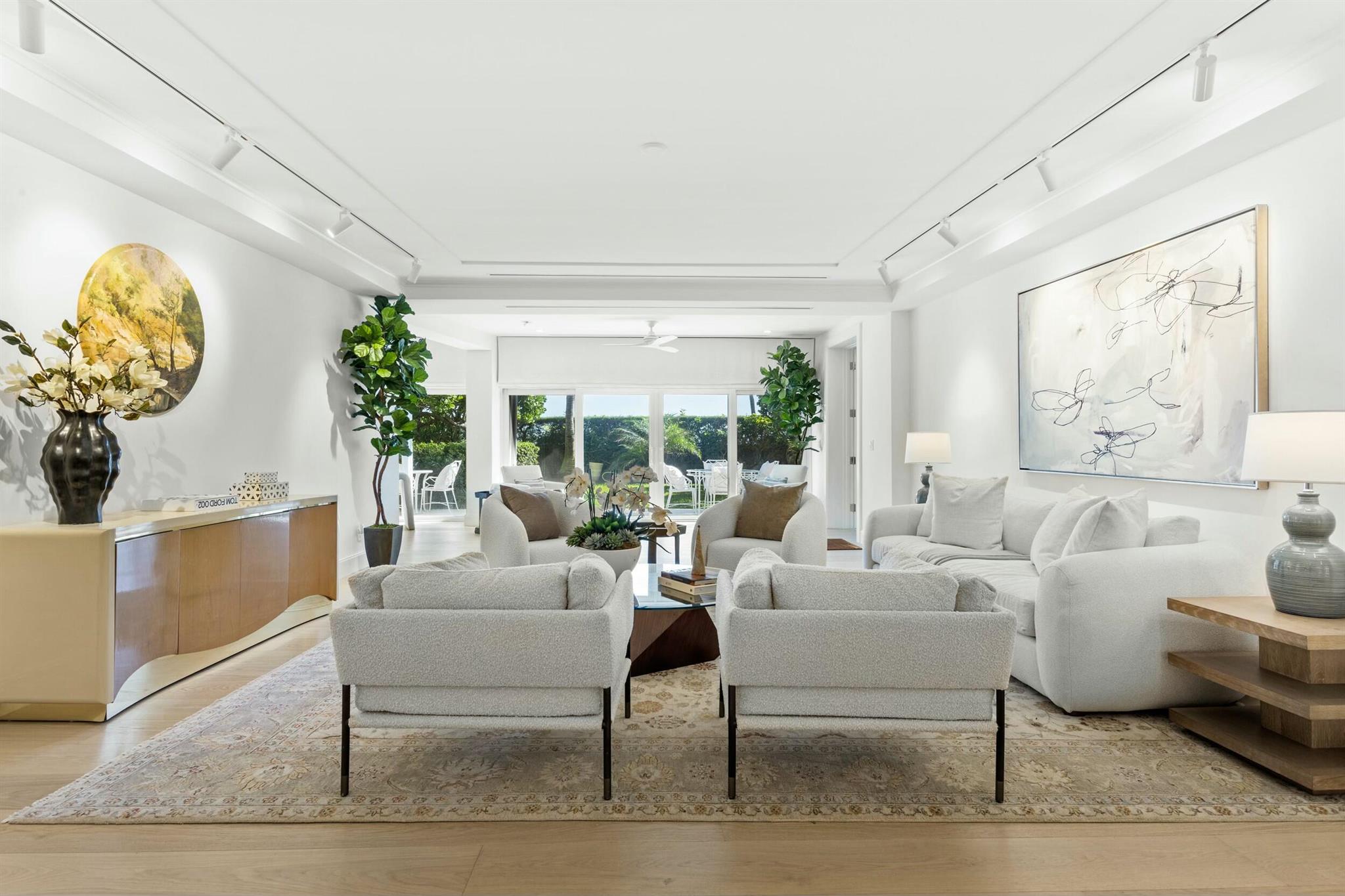Location, location, location! This oceanfront building is ideally located in Midtown Palm Beach. Walk everywhere from this beautifully renovated apartment in a coveted in town pet friendly oceanfront building boasts an open, airy floor plan with high-end finishes. High ceilings amplify the spacious feel, complemented by doors that open to the privacy of an expansive garden. Set in a pet-friendly, full-service building, this residence offers an exclusive blend of luxury and comfort. Wide plank oak floors and Waterworks fixtures enhance the sophisticated ambiance, while the gourmet kitchen is equipped with top-tier appliances, including Fisher & Paykel, Dacor, and Asko, quartz countertops, and custom cabinetry. This rare first floor condo with private ocean front garden perfect for pets.