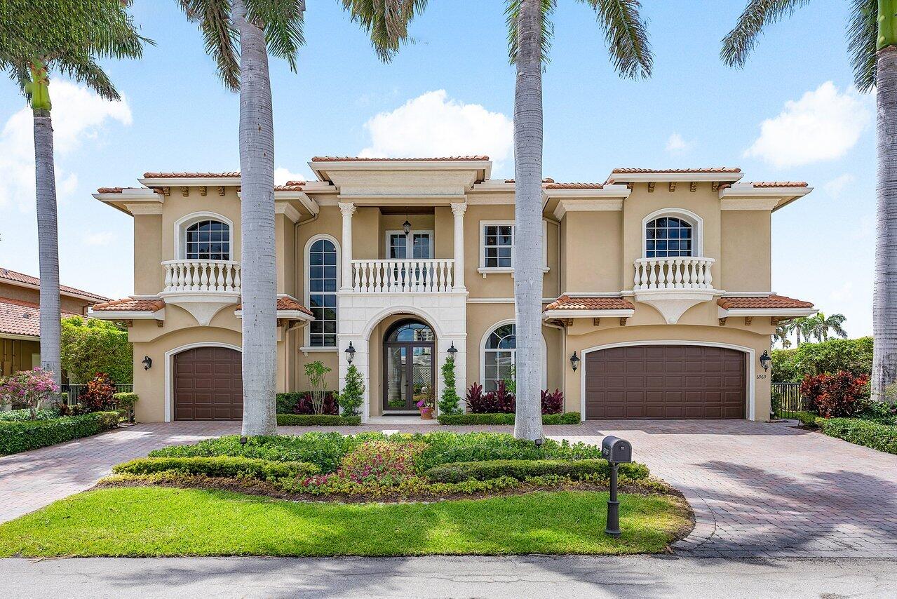 Nestled on the serene shores of Boca Harbour Island, 6969 NE 8th Drive in Boca Raton, Florida, unveils a waterfront haven that epitomizes luxury living at its finest. This exceptional property offers a boater's paradise with 85 feet of dockage space and a 12,000 lb. boat lift, providing easy access to the pristine waters of South Florida without the hindrance of fixed bridges. As you step inside this exquisite home, you are greeted by a sense of elegance and sophistication that permeates every corner. The residence boasts 5 bedrooms and 4.5 bathrooms, providing ample space for both comfortable living and entertaining guests in style. The updated kitchen and powder bath reflect contemporary design and high-end finishes, catering to the needs of the modern homeowner. The expansive living spaces seamlessly blend indoor and outdoor living, offering breathtaking views of the water and creating a seamless flow between the interior and exterior of the home. Whether enjoying a peaceful morning coffee on the waterfront terrace or hosting a lavish gathering under the stars, this property provides the perfect backdrop for every occasion. Impeccably maintained and thoughtfully designed, this home is a true sanctuary where every detail has been carefully considered to ensure a lifestyle of comfort and luxury. The stunning long water view adds a touch of tranquility to everyday life, creating a sense of serenity that is truly unmatched. Don't miss this rare opportunity to own a piece of paradise in Boca Raton. Embrace the waterfront lifestyle and experience the ultimate in luxury living at this extraordinary property on Boca Harbour Island.