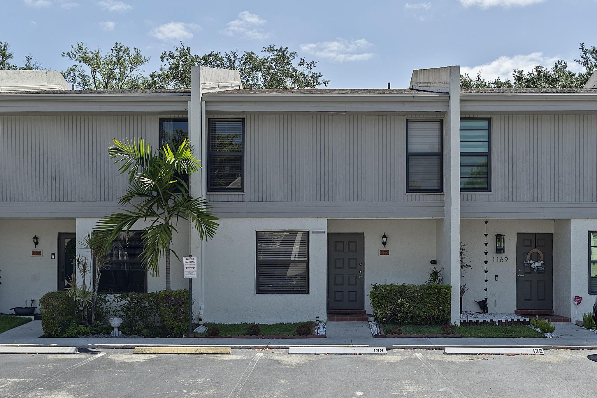 Spacious and well-maintained 3-bedroom, 2.5-bath townhouse located in the heart of Pembroke Pines. This home features a renovated kitchen, both upstairs bathrooms remodeled, and stunning lake views from the living room, kitchen, primary bedroom, and back patio. Enjoy a screened patio with an entertainment bar area, sink, and refrigerator hookup—perfect for outdoor enjoyment—overlooking a serene lake view. Tile flooring throughout the first level, with wood flooring on the staircase and throughout the upstairs bedrooms and bathrooms. The generous primary suite offers a walk-in closet and beautiful lake views. Additional highlights include full-size washer and dryer, impact windows and doors, and 2 assigned parking spaces plus additional guest parking conveniently located directly in front.