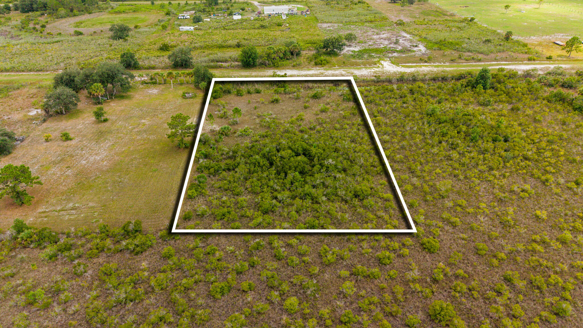 **VICKING LOT** 1.25 ACRES this property offers the perfect opportunity for new construction with utilities readily available. Plenty of space to create your ideal home or placement of a new mobile home.