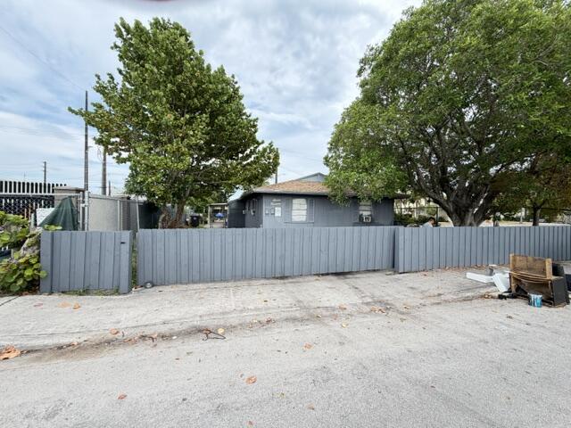 Showing is by appointment at your convenience. 2 units, roof was replaced 7/2021. There is Fixed RV at the Back, licensed and has all legal documents as ADU. RV and Both rented Units generating over $5,500 per month. One of the tenants has lived there for 20 years. The other tenant has been there over three years. Never any issues, RV unit and Duplex tenants both pay on the 1st like clock work! This home will be sold to the highest and best offer. Huge upside potential. This is not a short sale or foreclosure. Being sold "As IS" Brand new Fences with sliding car entrance gate and back side has wide door to get in from back side of the property. all recent upgrades are permitted by City of Lake Worth. Great income property !!! Nice crime free community.  Most of the population in the area are Spanish Americans. South side of the property has a well build huge Social organization building . North side of the property is City of Lake worth Electrical utility office. Whole front side has 24 hours video surveillance camera installed and monitor by City of Lake worth Electrical utility office. Information is deemed to be reliable, but is not guaranteed. © 2026 Beaches MLS, Inc. and FBS. The information on this sheet has been made available by the MLS, owner's provided information and may not be the listing of the provider.