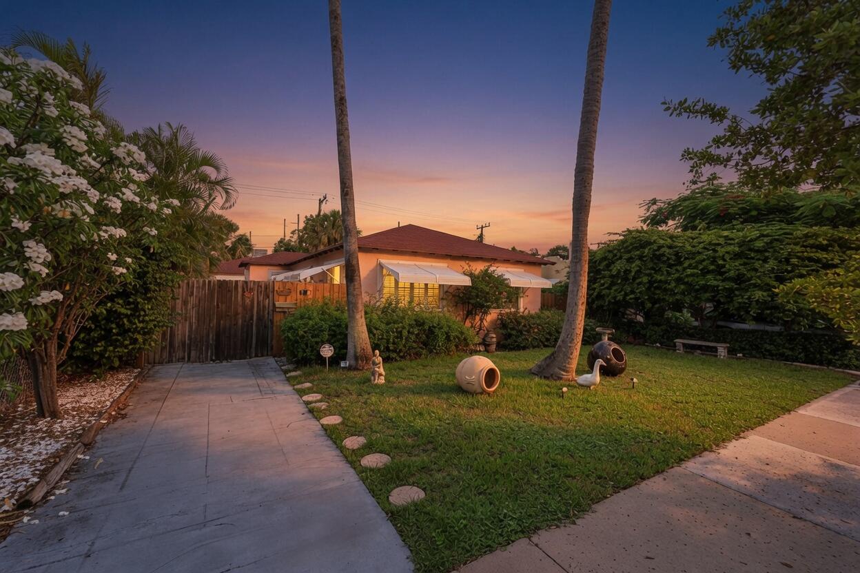 Charming, spacious, and move-in ready, this three-bedroom, one-bath home features beautifully refinished hardwood floors and elegant French doors. Ideally located within walking distance of Manatee Lagoon and nearby parks, the property also offers convenient access to downtown West Palm Beach, the Port of Palm Beach, and Singer Island. A detached garage with a separate apartment can be used for friends and family! Schedule your tour today!