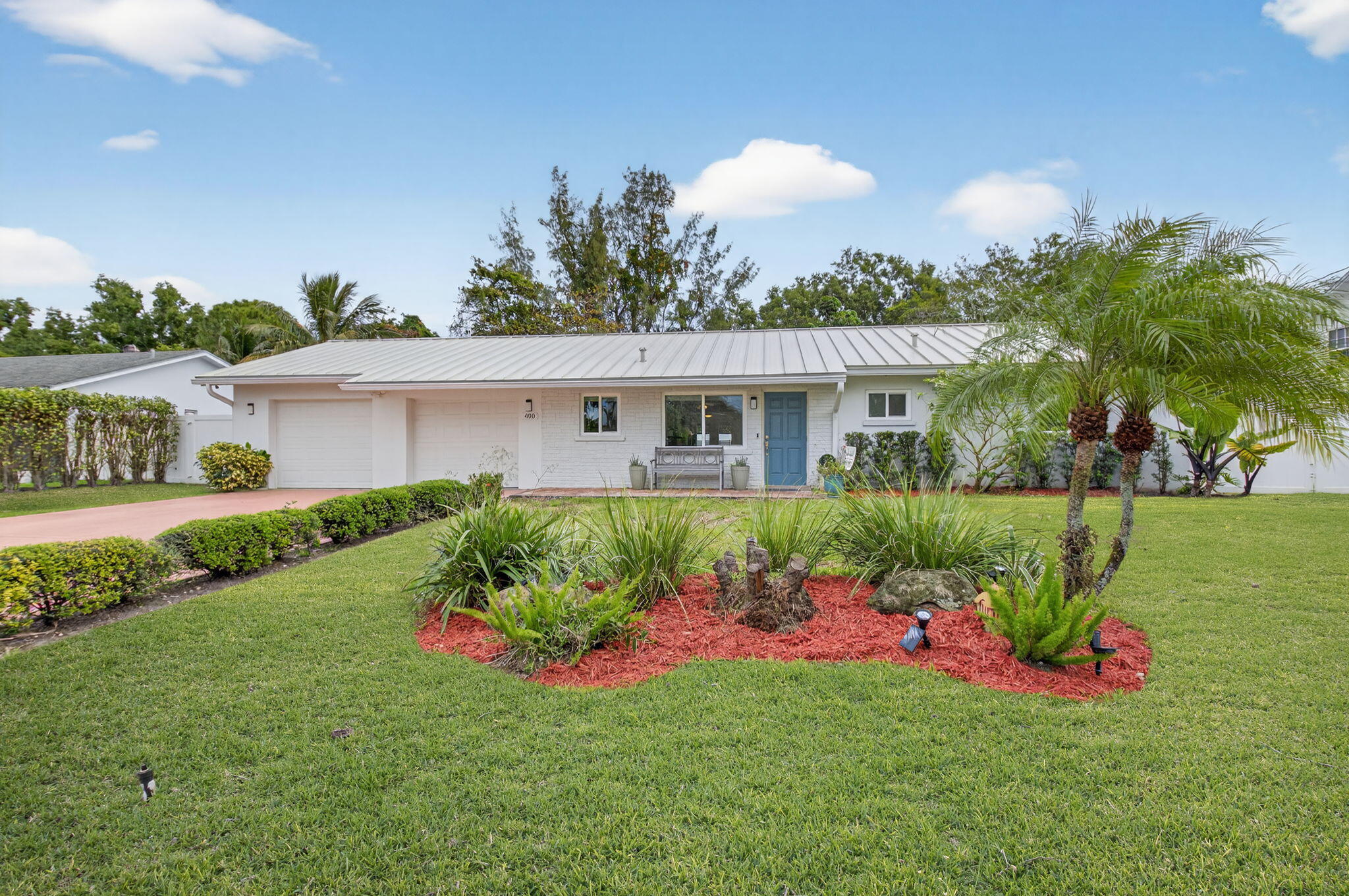 ***Owner is Motivated***  CERTIFIED APPRAISAL APRIL 2026,  $850,000*** Nestled on a quiet street in the highly sought after community of Paradise Palms.  This 3 bedroom, 3 bath ranch style pool home will simply feel like home! New pool in 2022, relax in your pool in the shallow sun shelf on your sleek in-pool loungers under an umbrella!  Florida Living at its Best!! New Metal Roof. All Hurricane Impact Windows. Air conditioned workshop. Oversized 3 car garage. Huge side yard with Boat/ RV parking. Zoned for State of the Art Blue Lake Elementary School, Omni Middle and Spanish River High. Excellent A- Rated Schools. Prime location within the City Limits of Boca Raton. Walk to Town Center Mall, Publix, Sugar Sand Park, Boca Center, Tap 42, Sixty Vines, Rocco's Tacos.