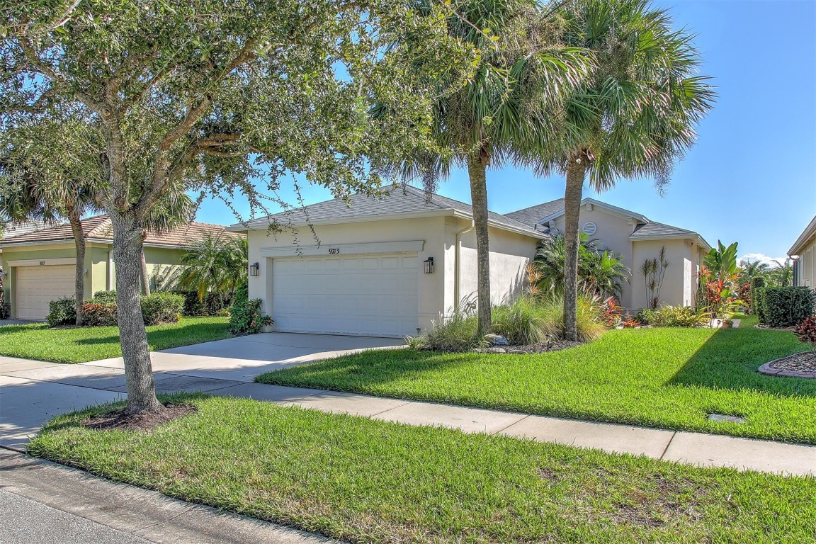 Beautiful Lakefront 3/2/2 in the gated community Heritage Oaks at Tradition. Bright open floor plan with updated kitchen with stainless steel appliances, tile flooring in living areas. Living room opens to patio with beautiful water view. Gated community includes lawn care, clubhouse with fitness center resort style pool and spa. Perfectly located near Tradition square, Cleveland clinic, medical offices,  shopping, restaurants and more. Hurricane protected with accordion shutters and NEW ROOF!! Convenient to i95 and crosstown parkway in the heart of Tradition don't miss this opportunity, book your showing appointment today!!