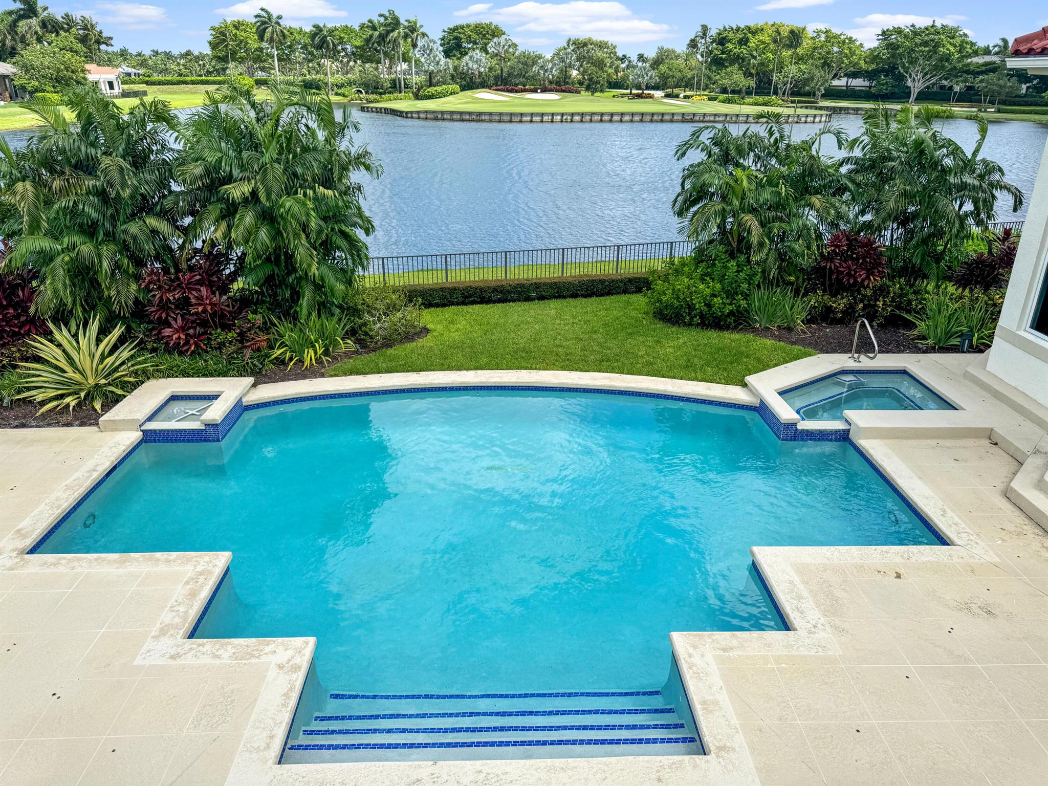 Don't miss one of the rarest and most spectacular pieces of property in all of Woodfield Country Club..... breathtaking golf course and water views! Features include his and her master ensuites, 6 bedrooms,10 bathrooms, his and her offices, a large gym, movie theater,  spacious loft, a temperature controlled wine room (accomodating 2000-2500 bottles of wine), first and second floor laundry facilities, full house generator, impact windows, second floor balcony over looking the lake/golf course, a 4 1/2 car garage and so much more.  WOW, WOW, WOW! This home has it all!