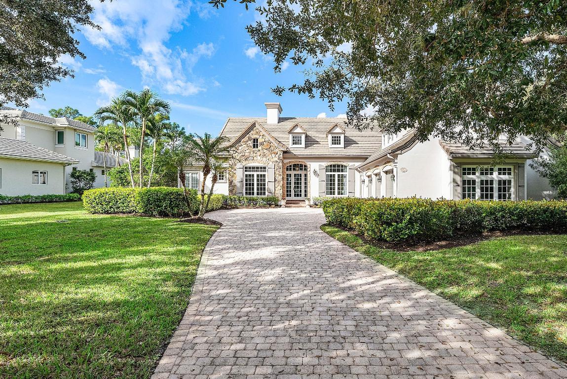This custom-built home sits on more than two-thirds of an acre in prestigious Old Marsh Golf Club. Move in ready! New bathrooms, ac and ventilation system, generator, hardwood flooring and interior and exterior lighting. Impact glass throughout. Updated kitchen and totally redecorated and painted with a custom family room built in and decorator furnishings. Enjoy breathtaking, peaceful and private views of the marsh from the living room, kitchen, family room and owner's suite. New electric shades. Inviting heated pool and spa and a covered lanai that houses a summer kitchen with a new marble counter and grill and phantom screens that can be raised and lowered to suit your needs. Each bedroom features a walk-in closet (two in the owner's suite) and its own ensuite bath There is plenty of storage space, including a 600 sq. ft. ''Florida Basement'' above the three car garage.  Then, of course, there is Old Marsh itself, a small and exclusive, gated community, tucked away and intimate, surrounded on three sides by hundreds of acres of beautiful nature preserves that will never be developed. Old Marsh contains only custom estate homes on half-acre or larger lots, with marsh, lake or golf course views. The 18-hole championship golf course that meanders through the community was designed by the highly renowned architect Pete Dye and consistently has been ranked one of the best in the United States. No starting times and a nationally acclaimed caddy program enrich your experience on the course. Old Marsh Golf Club, with its warm and friendly clubhouse and its service oriented staff, has been recognized as one of the top 35 private clubs in the country and Audubon International has awarded it certification for its environmentally enhancing design. All this and location too. Old Marsh is just minutes to the beach, the airport, shopping, restaurants, cultural venues and fine public and private schools.  A winning combination. Call today for a tour.