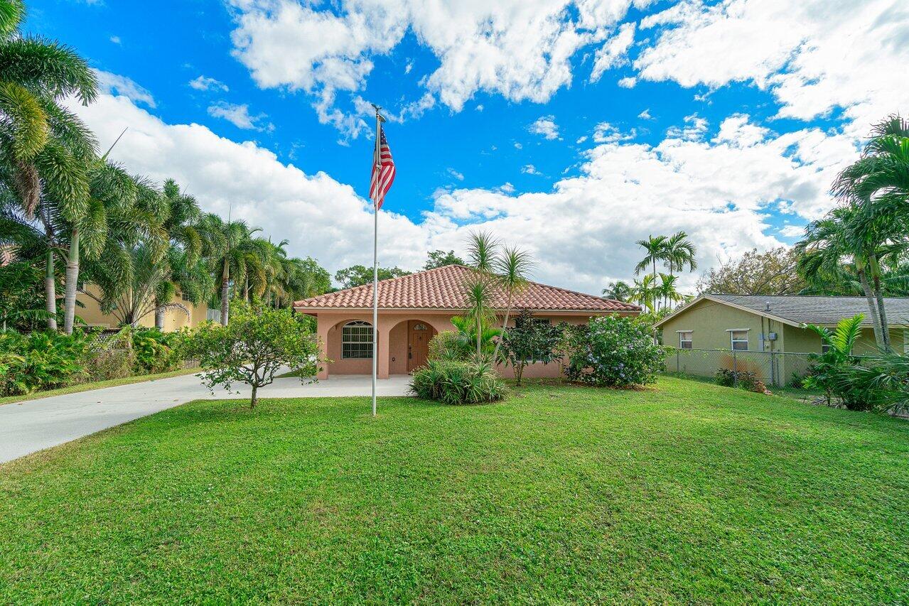 NO HOA! This beautifully maintained 3 bedroom, 2 bathroom single-family home with a 2 car attached garage features tile flooring throughout, this home offers a 3 way split floor plan, impact windows, updated kitchen, and a large laundry room with a full-size washer and dryer. The spacious primary suite boasts a large walk-in closet and a private en-suite bathroom with a walk-in shower and separate soaking tub. Conveniently located near shopping, dining, and major roadways nearby, Zonded for great schools. ** the detached garage is not included in the rental.