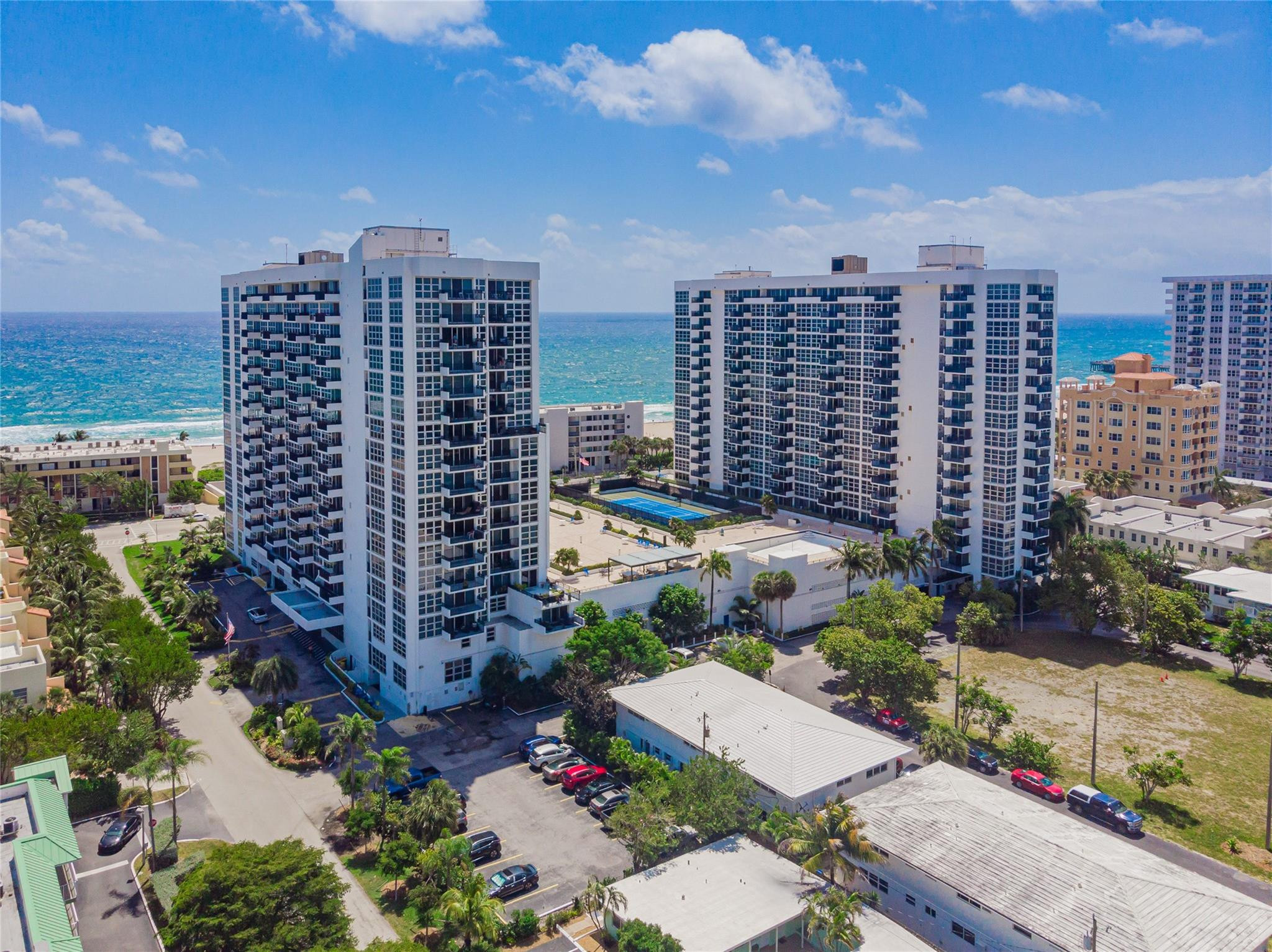Back on the Market , don't miss this opportunity .Well-appointed two-bedroom, two-bath residence overlooking beautiful Pompano Beach, just steps from the ocean. The bedrooms and living room feature floor-to-ceiling windows with stunning ocean views. Enjoy breakfast or evening cocktails on the spacious balcony overlooking the pool and the Atlantic. The cozy, fully equipped kitchen is ideal for entertaining, with a counter opening to the dining and living areas. Laundry facilities are conveniently located on the same floor. Building amenities include a fully equipped fitness center, large outdoor pool, tennis and pickleball courts. Walk along the beachfront boardwalk to Atlantic Boulevard, fish or stroll on the Pompano Pier, and enjoy nearby banks and many new oceanfront restaurants.