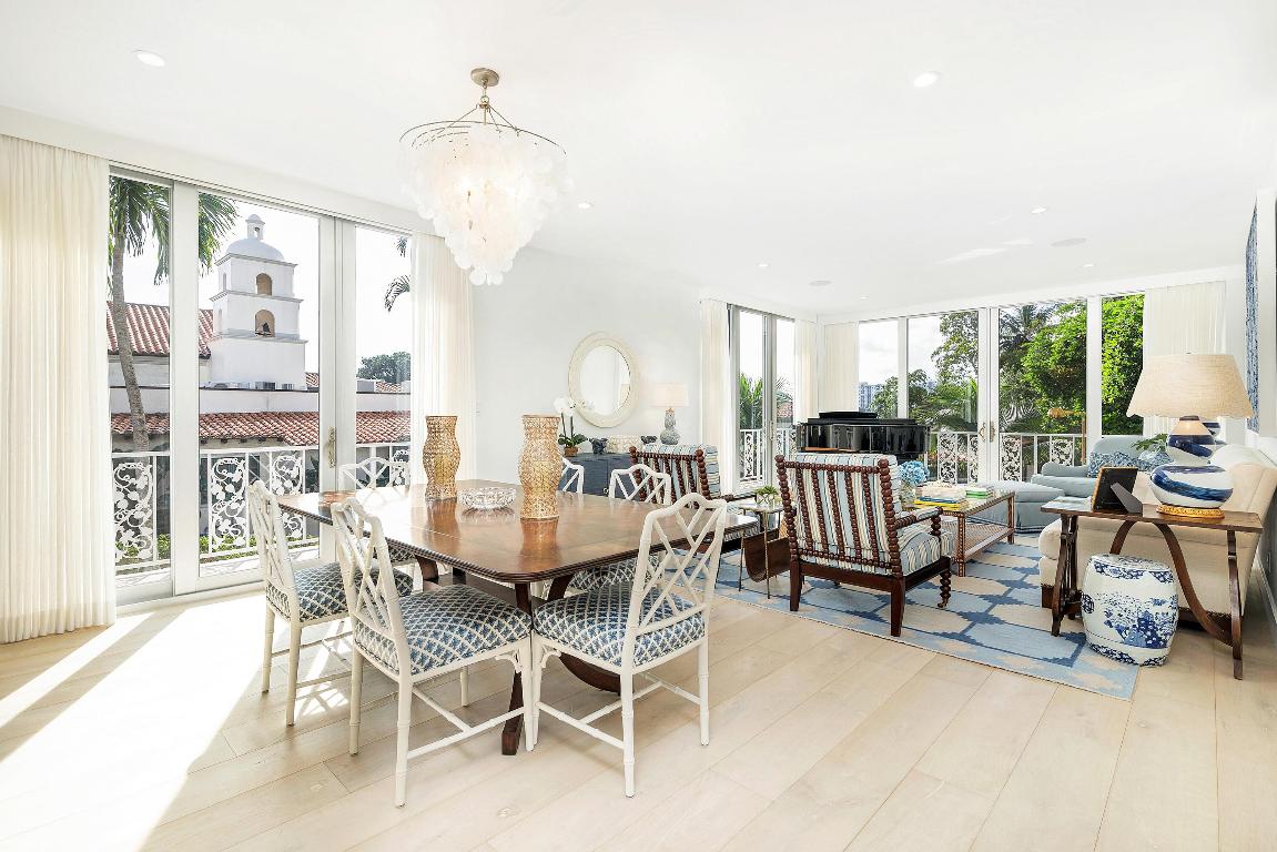 Located on renowned Worth Avenue, this beautifully updated three-bedroom, three-bathroom condominium offers 3,120+/- total square feet of refined in-town living.
The open-concept living and dining areas connect seamlessly into the thoughtfully designed kitchen—all facing south with picturesque views of Worth Avenue and lush tropical landscaping. Floor-to-ceiling doors and windows fill the interiors with natural light and open to a wraparound balcony that can be accessed from every room, creating an easy transition to the outdoors.
The primary suite features dual walk-in closets and a well-appointed bathroom with dual sinks, a soaking tub, and a shower. Each guest bedroom includes a walk-in closet, an adjacent bathroom, and access to the balcony.
Additional highlights include three garage parking spaces, a laundry room, and full impact-rated doors and windows.
Ideally situated in-town, close to restaurants, world-class shopping, the beach, Lake Trail, and the town docks. 401 Worth Avenue is an exclusive six-unit boutique building with a doorman and full-time manager.