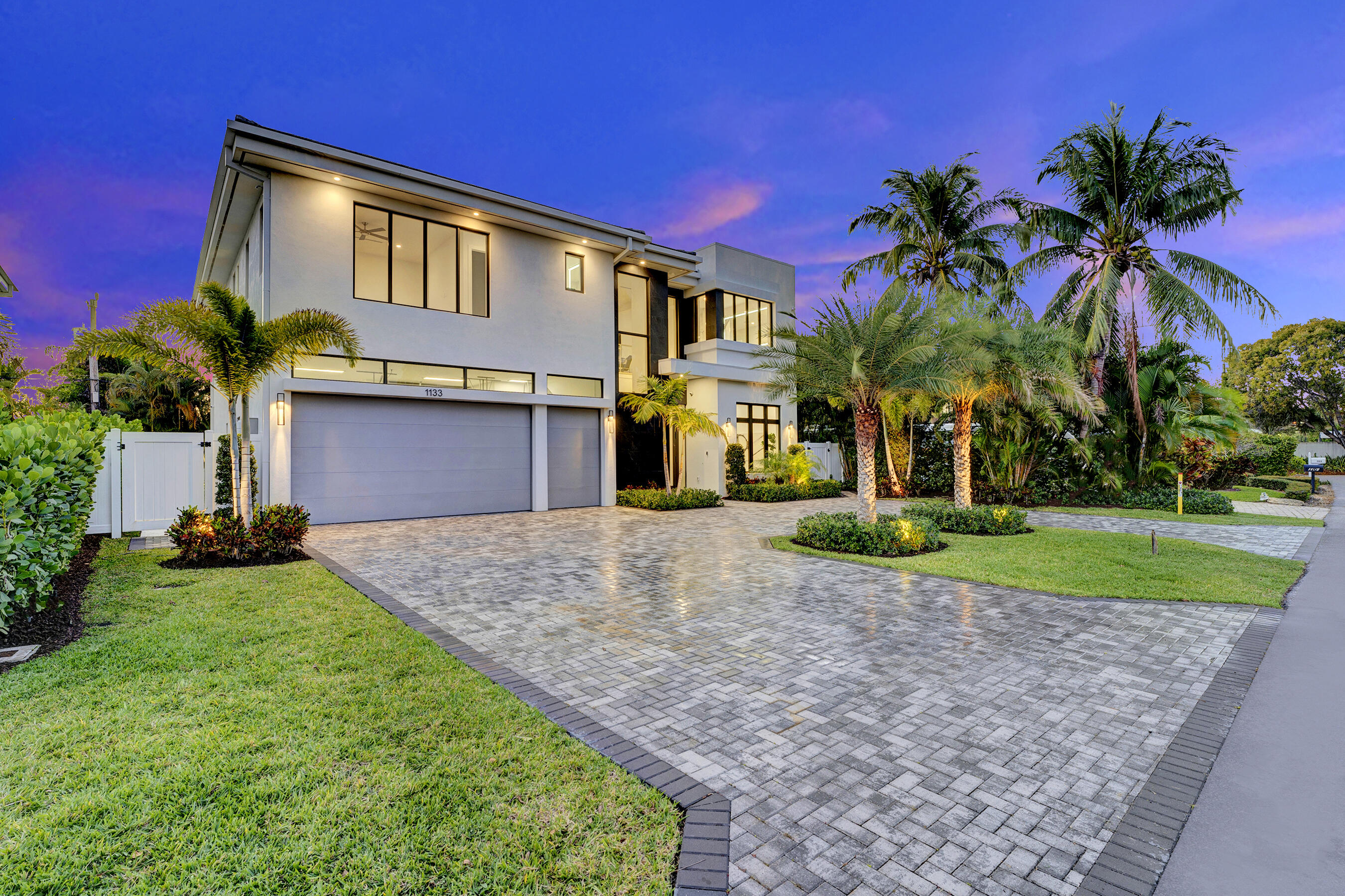Indulge in the art of exquisite living, just a whisper away from the chic boutiques of Mizner Park and the vibrant pulse of Downtown Boca! This brand-new residence presents a sophisticated twist on Boca Villas living, where every detail exudes effortless elegance and playful charm. Imagine a sprawling floor plan gracefully unfolding around a breathtaking, oversized kitchen, a culinary masterpiece appointed with coveted Wolf and Sub-Zero appliances. From this epicurean haven, step into your own private tropical sanctuary, boasting a sleek marble-clad pool deck, a dazzling saltwater pool that beckons for leisurely dips, and abundant space to unwind or host dazzling soirées.

A beautifully appointed first-floor suite offers delightful versatility - a serene haven for cherished guests or a refined home office where inspiration flows. Ascend to the upper level and discover a sun-drenched loft, a stylish second living space that seamlessly connects to three generously sized ensuite bedrooms, each a junior suite promising unparalleled comfort and privacy.

Prepare to be captivated by the luminous primary suite, a true sanctuary of indulgence. Here, discover the ultimate luxury: dual, completely independent spa-inspired bathrooms and showers, ensuring a sublime sense of personal space. And for your prized possessions? A spacious two-and-a-half-car garage awaits, ready to house your stylish Moke, nimble golf cart, or simply provide extra storage for your refined lifestyle. All this, just moments from the iconic Boca Raton resort, pristine sandy shores, and the endless delights this coveted locale has to offer. Prepare to embrace a life of luxurious ease and playful sophistication!