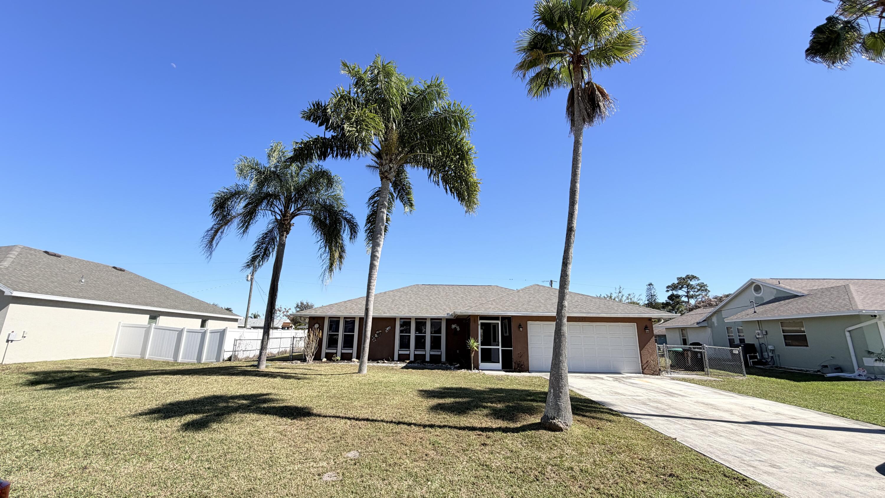 Market-Responsive Price Adjust Adjustment to $379,900.00 on this Beautiful 3/2 pool home in desirable East Port St. Lucie with a brand-new 2026 roof! This well-maintained property features a bright split-bedroom layout, spacious living areas, screened pool, large patio, and a 10,000+ sq ft lot with no HOA. Enjoy a quiet street close to beaches, shopping, dining, parks, and major roadways. Move-in ready and priced 10k less for a qualified AS IS purchase contract.