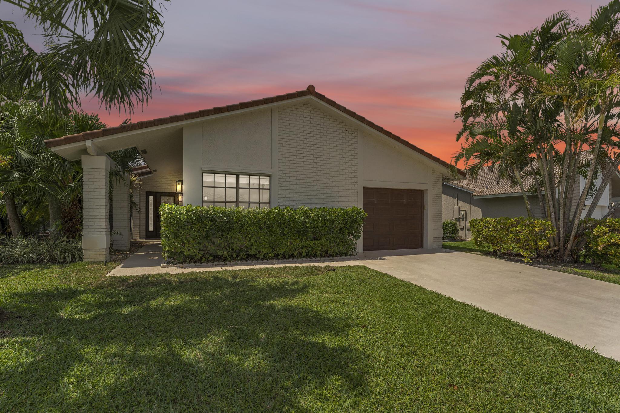 Charming 3BR/3BA pool home with a lake view in the gated Boca Greens community. This home features an updated kitchen, spacious floor plan, single-car garage, and screened patio perfect for year-round outdoor living. The private pool includes a convenient cabana bath. Rent includes internet, basic cable, routine lawn maintenance, scheduled pool service, and preventative pest control. Excellent location near top-rated schools, shopping, dining, and major roadways. Annual lease only. Quick HOA approval process.