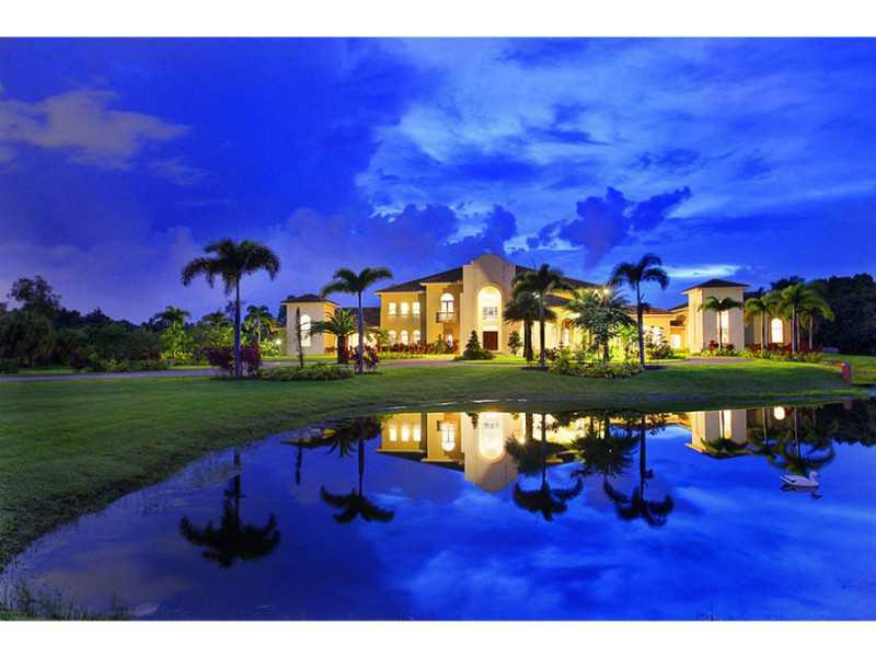An incredible value opportunity! "BRAND NEW," 2-story estate, completed in 2014. Never occupied & ready for 1st owner. Grand foyer with dual stairs, sumptuous master suite with custom spa & sauna, gourmet kitchen, unique sports parlor with "hideaway" Bbal l hoop, massive outdoor pool & more! On 4 manicured acres, with private lake. Gated, with mature landscaping for privacy. Min. 24-hour notice for showings.