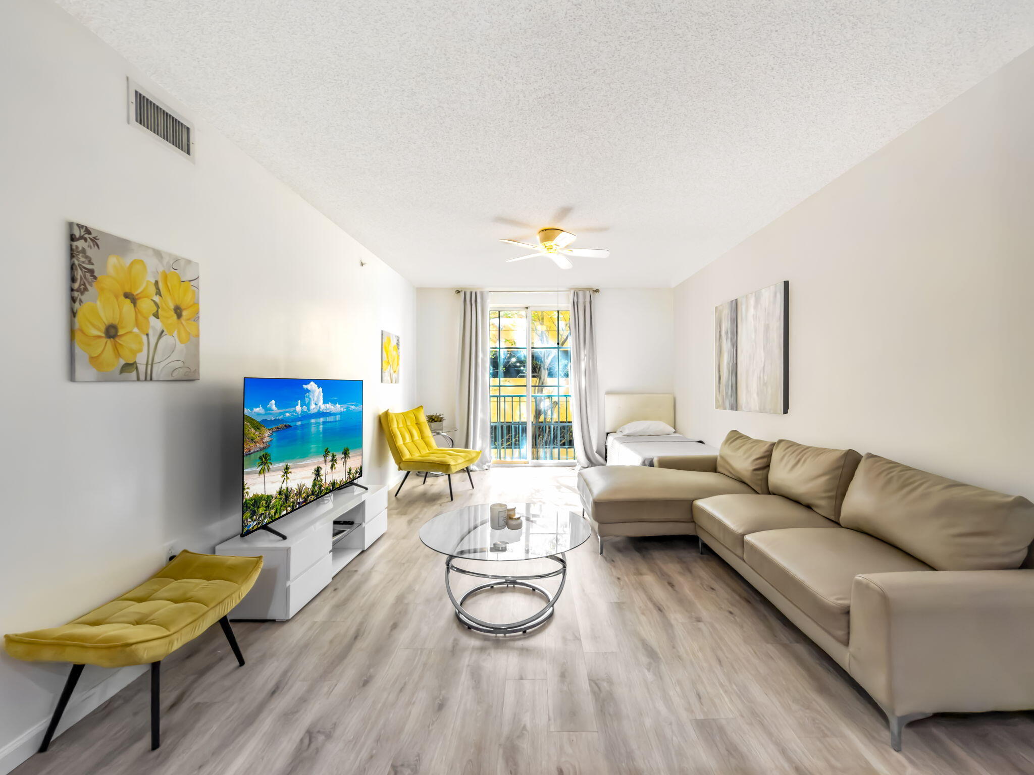 Are you looking to live in the heart of this booming city??? The Courtyards offers full resort-style amenities including a concierge, fitness center, pool, spa, business center, and more. Located right in the heart of CityPlace, you're just steps from restaurants, shopping, entertainment, the convention center, and the Kravis Center, with beaches and Palm Beach International Airport only about ten minutes away.
This beautifully maintained residence offers 2 oversized en-suite primary bedrooms, a generous living area, a separate dining space, and a true laundry and pantry room that's hard to find. Storage is a major bonus here with three walk-in closets plus two additional linen closets.
The kitchen and bathrooms have been tastefully updated with elegant cabinetry, stainless steel appliances, and wood-look flooring that runs throughout the unit. A full-size washer and dryer are included!

The unit also comes with a secure, assigned parking space in the attached garage, conveniently located on the same level.