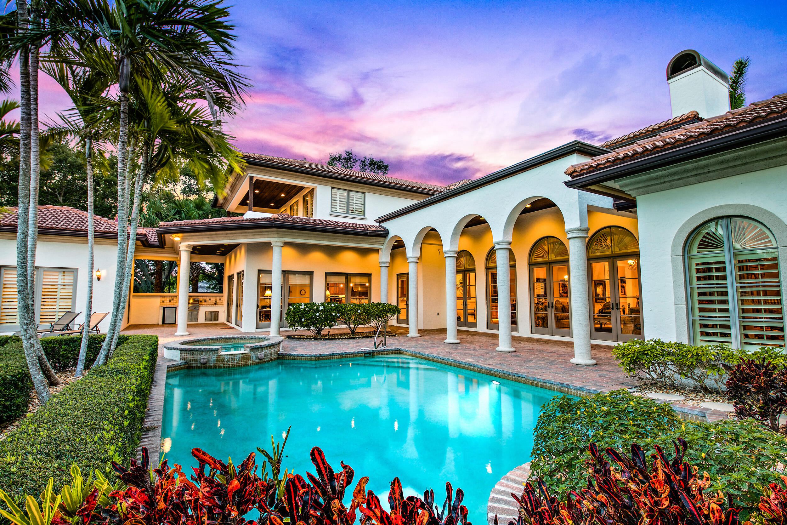 Magnificent corner lot with long southern water views.  7300 sq. foot home with 5 bedrooms and a guest house.   Easy access to the Intracoastal for boaters and close to the club house and five star amenities Admirals Cove has to offer.