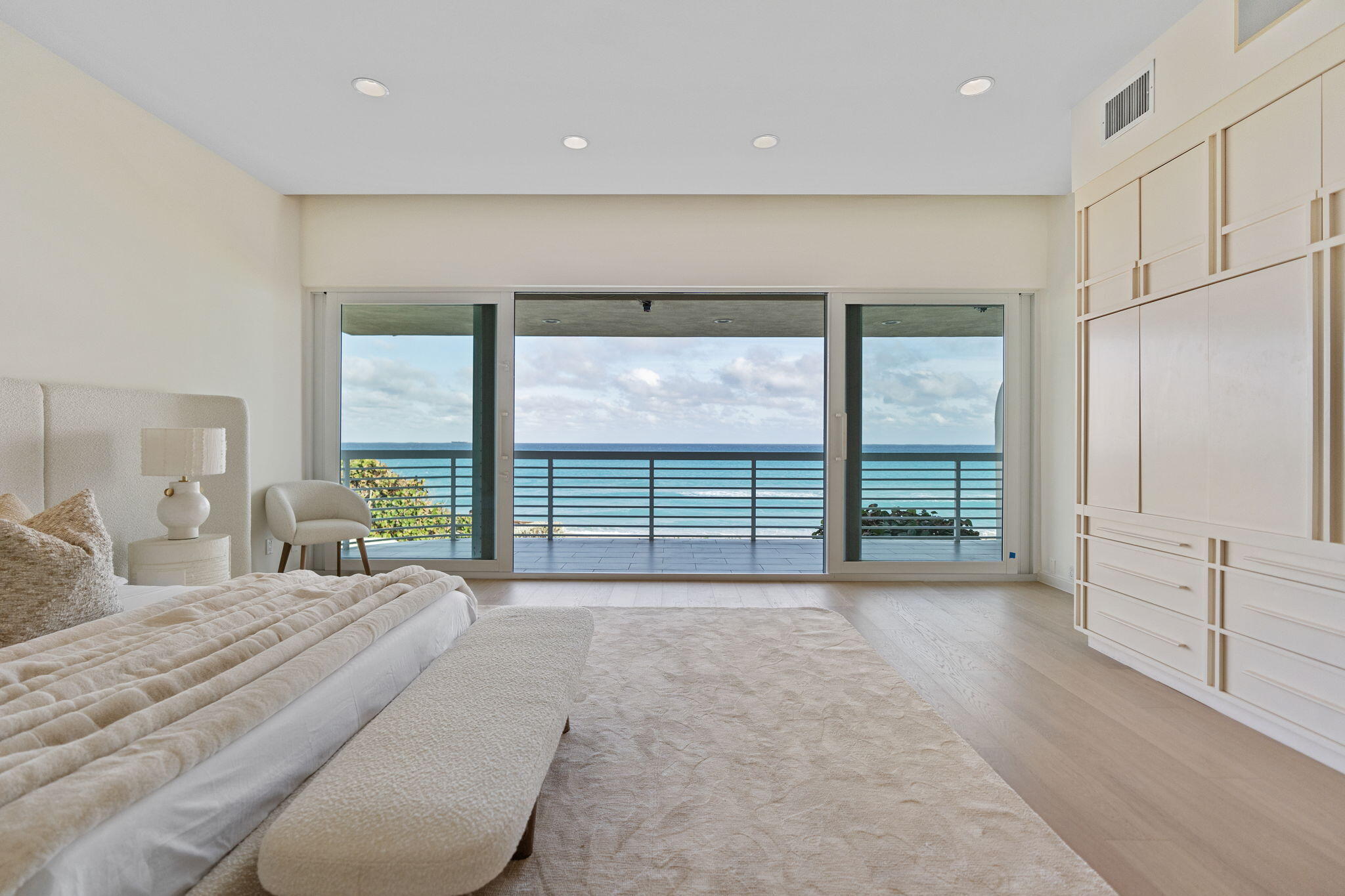 Enjoy beachfront living and breathtaking ocean views from this expansive 5 bedroom townhouse. Featuring over 62' of frontage on the sand, high ceilings, a private swimming pool and an open floor plan, 1 Sloan's Curve Dr is ready for turn key easy living and entertaining. The Residences at Sloan's Curve are part of an exclusive gated community that offers beach access, clay tennis courts, fitness, swimming pool, 24/7 security and a full time manager.