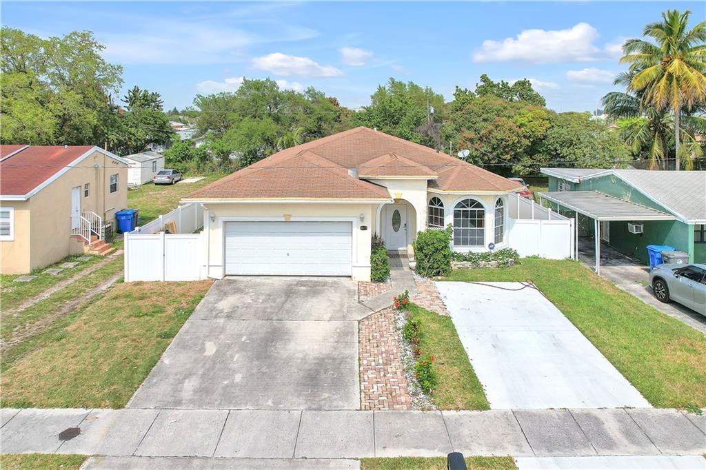 Welcome to an up and coming West Park! This 4 BR 2.5 BA Single Family home with high ceilings is just what you're looking for. Very spacious home with over 2400 SQ FT of living space. Spacious master bedroom with a large ensuite bathroom and three nice size BR. Backyard has a lot of space to add a pool. There is a projector with screen in the living room that comes with the home! Security cameras and alarm conveys. There is a fire station at the end of the block. Close to Hospitals, I-95, 441 and Turnpike .