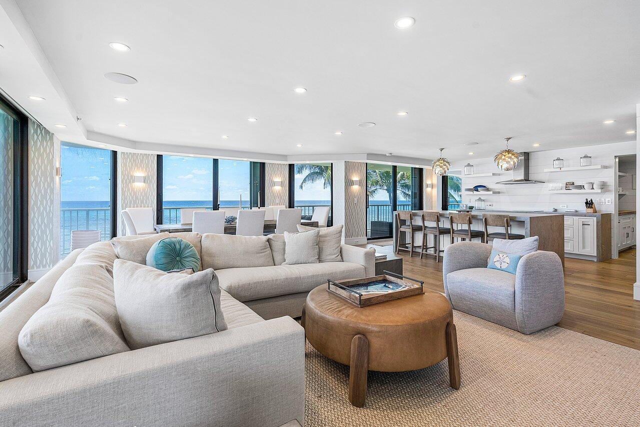 Completely reimagined and renovated, one of a kind, direct ocean condo in the luxurious Enclave! This beautiful unit features top of the line features including a drop-down theatre in the primary bedroom, 6 TVs, Miele dishwasher and a commercial dishwasher that runs a cycle in 80 seconds and Lutron motorized black out shades in each room. Other features include: imported white oak flooring in the living areas and bedrooms, dolomite bathrooms, Wolf cook top and convection oven, motorized privacy wall to pantry, a laundry room and storage space complete this condo. The Enclave boasts a newly renovated lobby/ hallways, numerous amenities, including a pool with spa. Deeded ocean access, large fitness center, tennis courts, a guest suite, doorman, and 24-hour manned gate house.