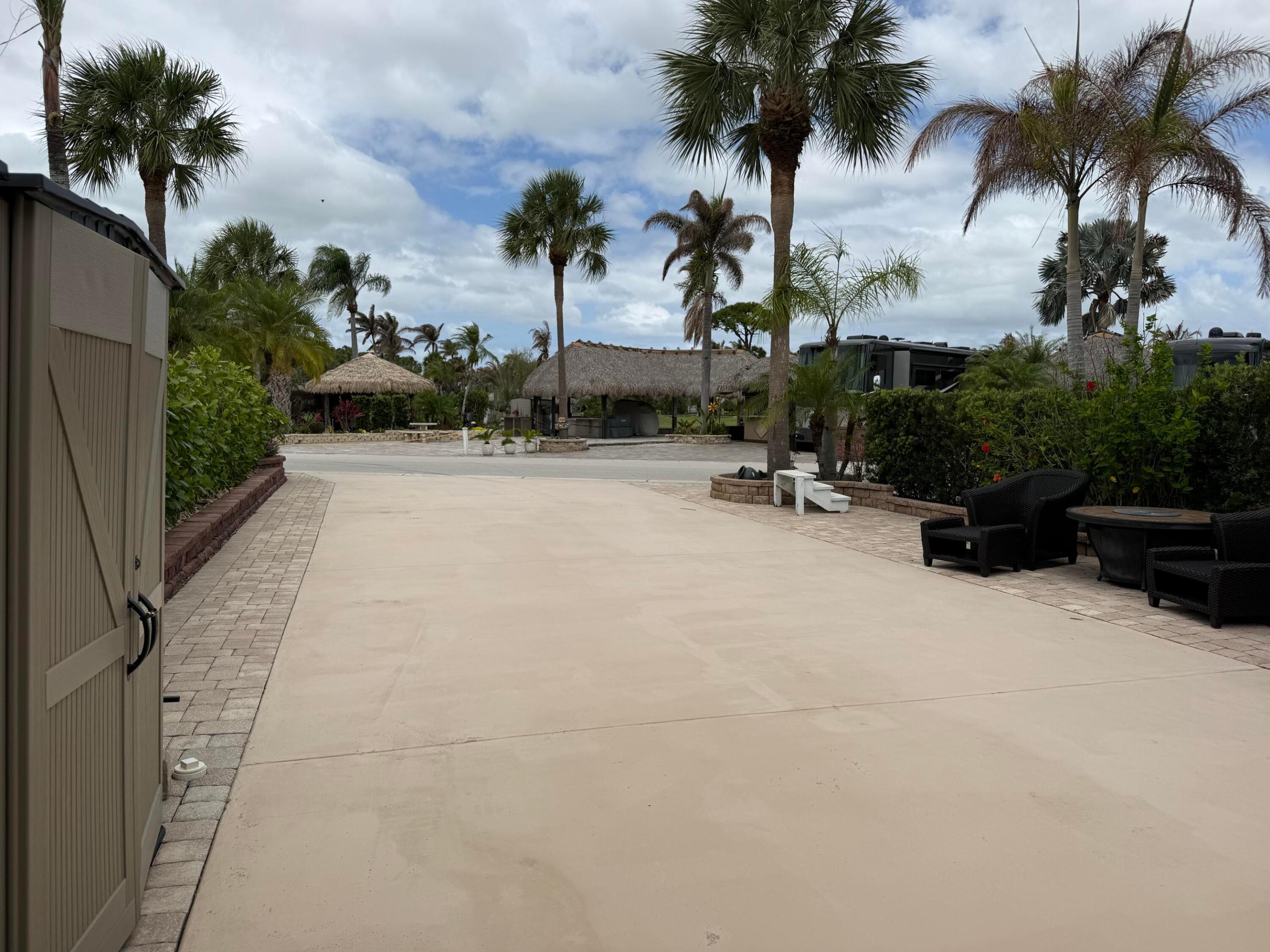 Beautiful lot looking out at the golf course. Enjoy this lot with a newly thatched tiki and shades. Perfect for entertaining or just lounging to read a great book. MCRSLW has plenty to offer with a very active community. Enjoy a game of golf, pickle ball, bocce, shuffleboard, tennis, billiards, darts. go to the gym or grab a book at the library.
