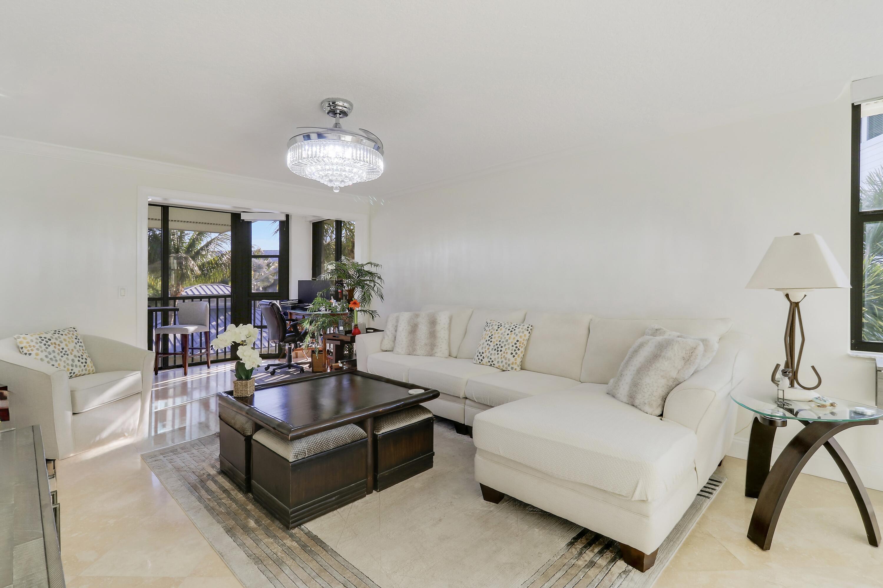 Look no further: Rarely available 3BR/2BA top-floor end unit in the highly sought-after, resort-style community of Bay Colony! Enjoy breathtaking sunsets with marina, Intracoastal & pool views from the fully enclosed balcony. Beautifully remodeled featuring granite countertops, stainless steel appliances, hurricane impact windows, tile flooring & crown molding throughout, a large walk-in closet in the primary & more. Situated on nearly 14 acres with two private marinas, resort-style saltwater pool, spa, fitness center, clubhouse, tennis, pickleball, bocce & lush tropical grounds. A prime location just minutes to Juno Beach, Juno Pier, dining & shopping. True coastal luxury living!