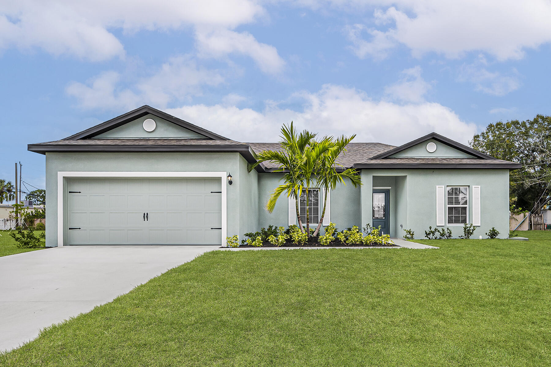 Ask about our builder-paid closing costs & no down payment options! Presenting the Braden floor plan at Port St. Lucie - a 3-bedroom, 2-bath retreat designed for comfortable living. The open layout, featuring energy-efficient Whirlpool® appliances and granite countertops, makes hosting a breeze. With thousands of dollars in upgrades, including front yard landscaping, an attached two-car garage, and a private master retreat with a spacious walk-in closet, the Braden is built for comfort and style. Located in a premier area, Port St. Lucie offers residents easy access to local parks, pristine beaches, and recreational activities. Enjoy top-rated schools, shopping, and dining nearby! **Appliance models subject to availability.**