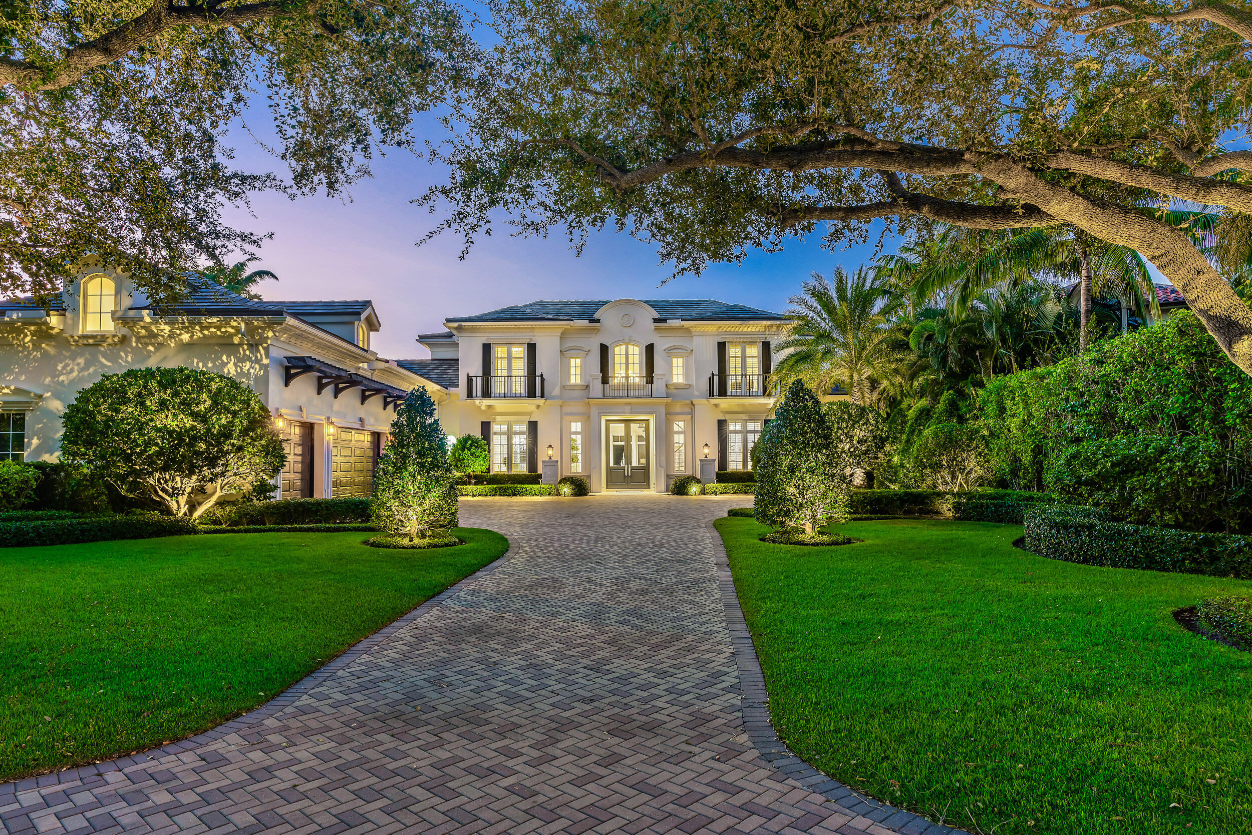 Grand Waterfront Estate - Paradise is Found.  This home has everything and more!  Located on a quiet cul-de-sac street close to The Club and entrance with the golf course as your front yard and the waterway as your backyard. Four oversized guest suites, grand primary bedrooms with dual separate baths and closets, covered and screen outdoor living room with summer kitchen, fireplace and tv is just a sampling of this homes luxurious appointments. The first floor is great for a casual day or lavish entertaining, open family room and kitchen that features a chef's kitchen with Wolfe Gas Range, Sub Zero Frig and Freezer, massive prep island, wine room or climate controlled pantry, French doors to outdoor living room..  Relax pool side or under the cool shade of the perfect outdoor living space. The lavish primary bedroom suite is conveniently located on the first floor and boasts wood and marble flooring, 2 separate full baths and closets, crystal chandeliers, views of waterways and pool.  The second-floor features 3 bedrooms with private baths, oversized media room/office/second floor living room, high ceilings and all are beautifully appointed.  This home will not​​‌​​​​‌​‌​​​‌‌​​​‌‌‌​​‌​​‌‌​​​​ last.