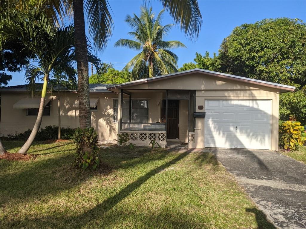 New Roof, new paint inside and out. Huge backyard, lots of fruit trees. Close to Downtown Fort Lauderdale and the beaches. Easy access to I-95 and the Turnpike. All measurements are estimates.