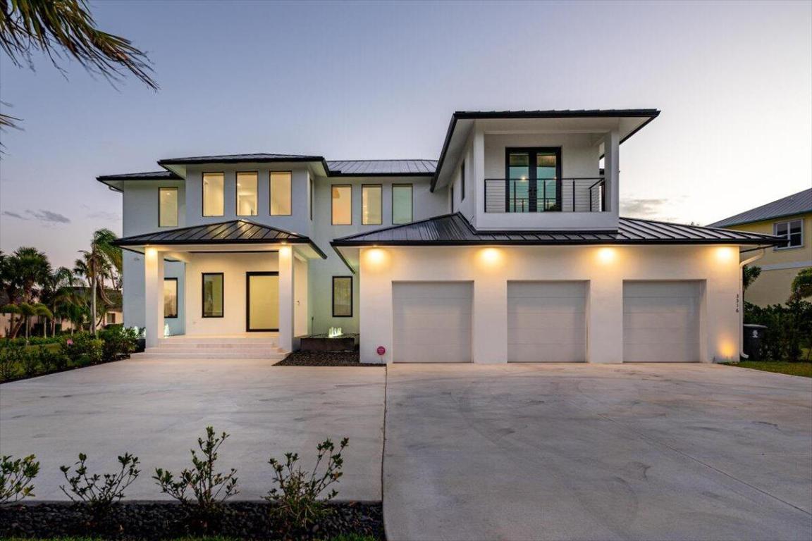 An Absolute Stunning Ocean Access Waterfront Estate sitting on a Sprawling 1.5 Acres! This Practically New 4BR 3.5BA Modern Contemporary Gem Backs up to a Bay on The North Fork of the St Lucie River with absolute stunning views of the water! Located in Beautiful River Vista, this is An Excellent Opportunity to have your Custom Dock Installed and have your boat waiting for you in your backyard. Walking in you will instantly notice the Architecturally Clean Lines throughout. This Estate home features Two Master Suits, a Home Gym, Movie Room, Custom Closets, Heated Salt Pool and Spa, Sleek Kitchen with Thermador Appliances. So many Possibilities for this oversized property, Including multi-car garage, tennis Court or In-Law suite. This Home is absolute Must See!