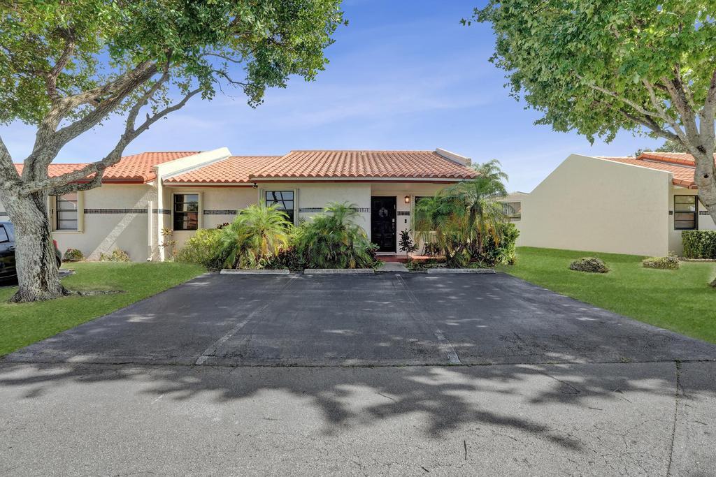 An updated and spacious corner villa in Forest Lake community at the heart of Cooper City! This spacious 3-bedroom, 2.5-bathroom home features a 3 year old tile roof, an updated kitchen and bathrooms, and a bright, open floor plan with soaring vaulted ceilings in the living area. An open concept kitchen offers granite countertops and newer stainless steel appliances.  A fenced-in back patio, perfect for entertainment.  3 parking spaces assigned to the unit.  Centrally located, with an easy access to main roads, restaurants, shopping centers and places of worship.  A++ school zone!!!