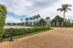 Rare opportunity to own almost 7-acres with direct access to WEF. This amazing farm includes 35 stalls, 2 sand arenas with top-of-the-line footing and a large grass grand prix field. Living quarters include a generous owners lounge with kitchen and bedroom, two (2) bedroom grooms quarters and a deluxe managers apartment. Meticulously maintained private sanctuary touching the horse show.