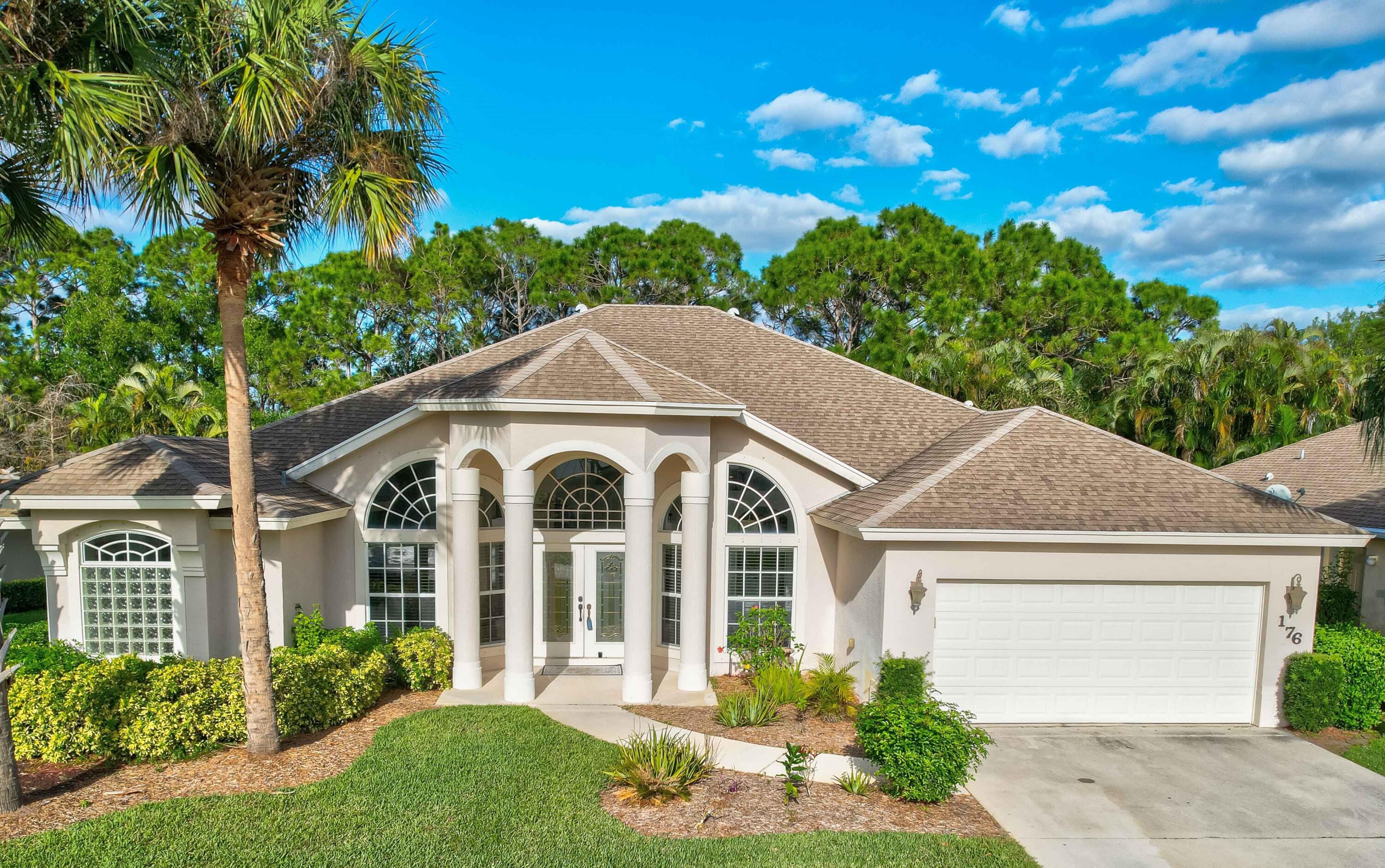 This stunning home was built by Royal Professional Builders with poured concrete and insulated walls for lasting strength and efficiency. The popular Liberty model offers a spacious floorplan with 4 bedrooms plus a den that easily converts to a 5th bedroom, 3 full baths, and a 2-car garage.  One of the baths doubles as a cabana bath with direct access to the screened-in pool and patio—perfect for entertaining. The kitchen has been recently upgraded with new quartz counters, stainless steel sink, modern faucet, and a custom tile backsplash.  Inside, soaring ceilings and an open-concept layout create a light, airy feel that makes the home live even larger. Outside, enjoy the spacious fenced yard, covered and screened patio or take a dip in the custom-built pool with heated spa.  Roof and HVAC were installed in 2006