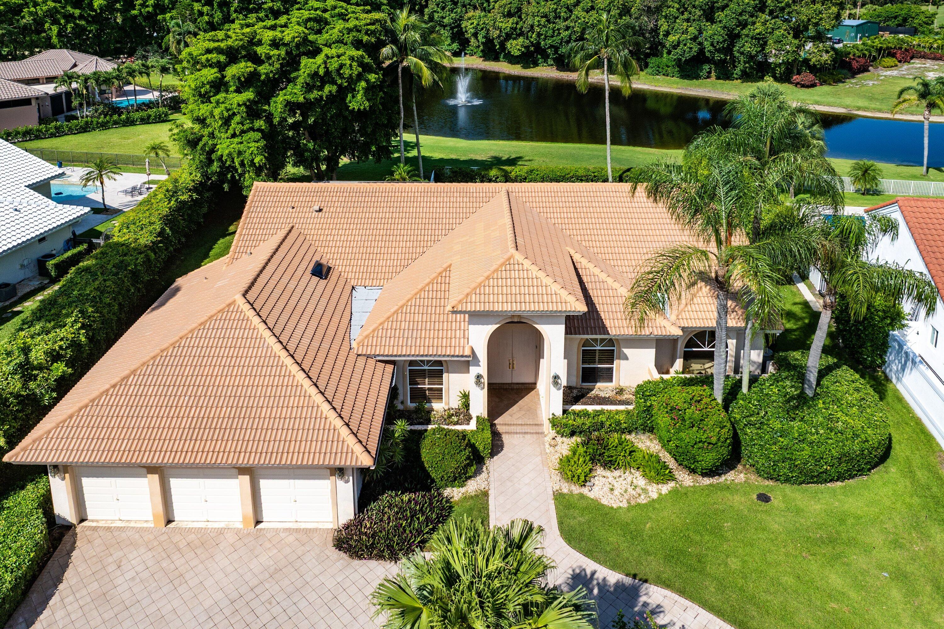 Spectacular private lakefront property on .37 acres on a quiet cul-de-sac within the highly desirable Bocaire Country Club. This well-laid out home features 3 spacious split bedrooms, 3 full bathrooms, and an open-concept kitchen flowing seamlessly into the family room.  Enjoy tranquil water views from the large screened-in patio overlooking the lake and fountain. Additional highlights include a propane tank and generator. A rare opportunity to create your dream home in one of Boca Raton's premier country club communities. Bocaire Country Club is a boutique club with only 239 homes offering resort-style amenities, championship golf, racquets, 24 hr fitness, high-end dining & a welcoming community. Parents, children and grandchildren have access to the amazing facilities! Close to beaches,  great restaurants, entertainment, shopping, PBI and FLL airports, Delray's Atlantic Ave and Mizner Park, Bocaire is also in an A rated school zone.