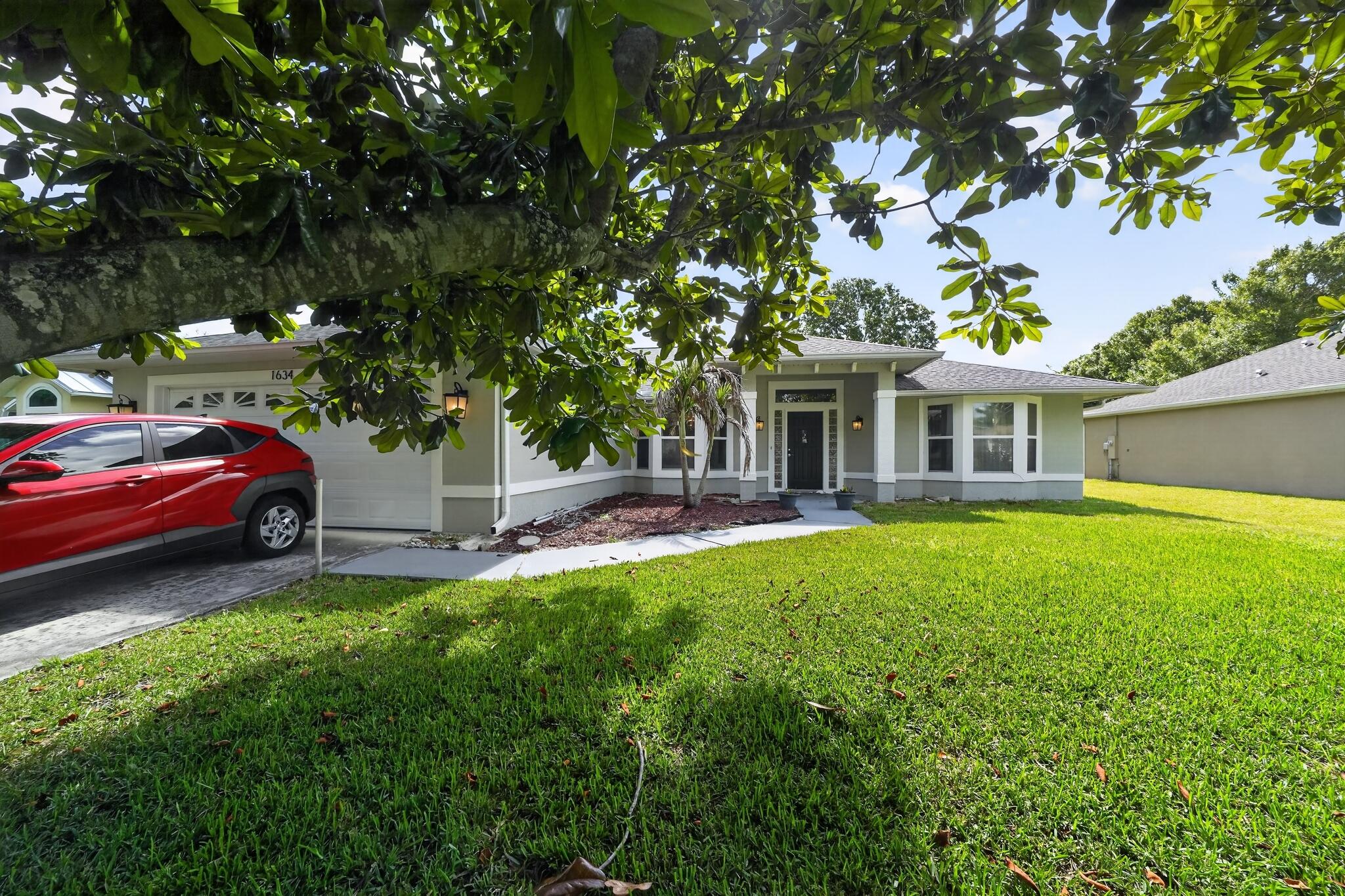 Beautifully maintained 3BR/2BA home in the heart of Sebastian priced at just $360,000! This move-in ready property features a spacious open floor plan with soaring ceilings, abundant natural light, and a stunning updated kitchen complete with oversized island, modern white cabinetry, stainless steel appliances, and plenty of counter space perfect for entertaining. Large living and dining areas flow seamlessly for comfortable everyday living. Exterior offers great curb appeal with a well-kept yard and peaceful residential setting. Conveniently located near shopping, dining, parks, and just a short drive to the river and beaches. Rare opportunity to own a turnkey home in one of Sebastian's most desirable price points!