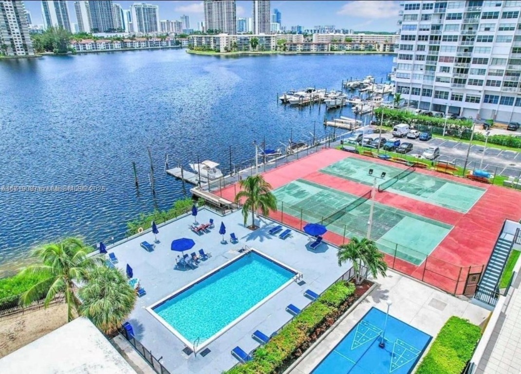 LOCATION, LOCATION, LOCATION, Beautiful Aventura!  Discover a very spacious, natural light and breathtaking water views. This quiet unit has been updated with brand-new soundproof and hurricane-proof windows; new PVC plumbing; and a 2-year-old A/C unit. The generously sized bedroom and living area offer plenty of closets and ample storage, including a walk-in closet and four extra closets, plus an assigned extra storage unit. An additional parking spot is also available. (inquire) 24-hour security and concierge services. Great amenities, including two tennis courts, two swimming pools, gym, boating dock, and storage for paddle boards. Close to grocery stores, restaurants, and shops, including Aventura Mall, and a 10-minute drive to the beach. * Also for lease 2200.00/mos