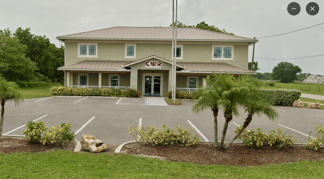 Professional 4,186± SF two-story office headquarters built in 2015 on .321± acres. Features elevator access, executive offices, conference room, reception area, kitchen/break room, file and records storage, paved parking, and multiple private offices. Ideal for contractors, engineering firms, agricultural businesses, transportation companies, medical, governmental, or professional service users seeking a turnkey facility. Conveniently located with easy access to US Hwy 441 and SR 70. Adjacent 1.377± acre Light Industrial yard with approximately 300 feet of railway frontage is available under MLS #B26042553. Purchase separately or together as a unique office and industrial campus opportunity.