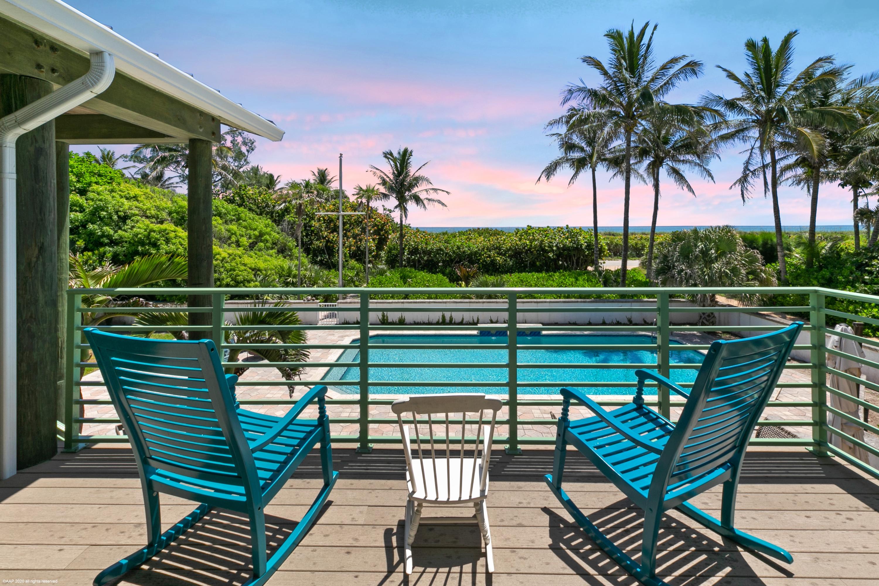 Watch the sun rise from 130 N Beach Rd; the ultimate beach house. The floor plan upstairs includes the main living room, dining space and kitchen which opens into an inviting screened-in porch with wide ocean views.  The downstairs family/cabana room overlooks the pool which features expansive sunning and seating. There are four bedroom suites...two up and two down including an attached two bedroom guest house with a separate entrance.