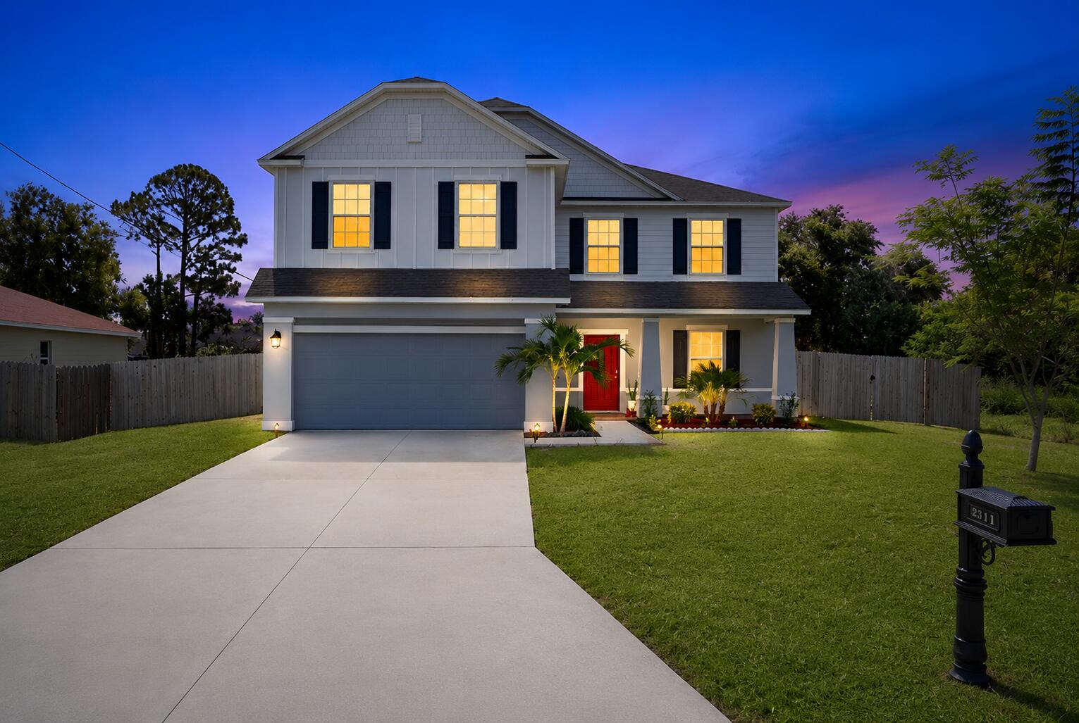 Custom built in 2019, this beautifully upgraded home offers the perfect blend of style, comfort, and functionality. Designed for both everyday living and entertaining, the open-concept floor plan features a cozy fireplace, tile and laminate flooring throughout, and a well-appointed kitchen with pull-out cabinet organizers, a large pantry, and additional storage tucked neatly beneath the staircase.  With 5 spacious bedrooms plus a bonus room ideal for a home office, study, or playroom, there's room for everyone. The second floor also offers a versatile loft and the convenience of an upstairs laundry room.  Step outside to enjoy the large, fully fenced backyard featuring a pergola and a covered patio that spans the length of the home—perfect for hosting family and friends or relaxing outdoor The spacious yard offers plenty of room to add a pool, creating your own private backyard oasis. The epoxy-coated 2-car garage adds both style and durability. No neighbors next door! City Owned Property.  With no HOA, you'll enjoy the freedom to park your RV, boat, or other recreational vehicles right on your property. Ideally located just minutes from Tradition, shopping, dining, and major highways, this move-in-ready home is packed with upgrades and is truly a must-see!