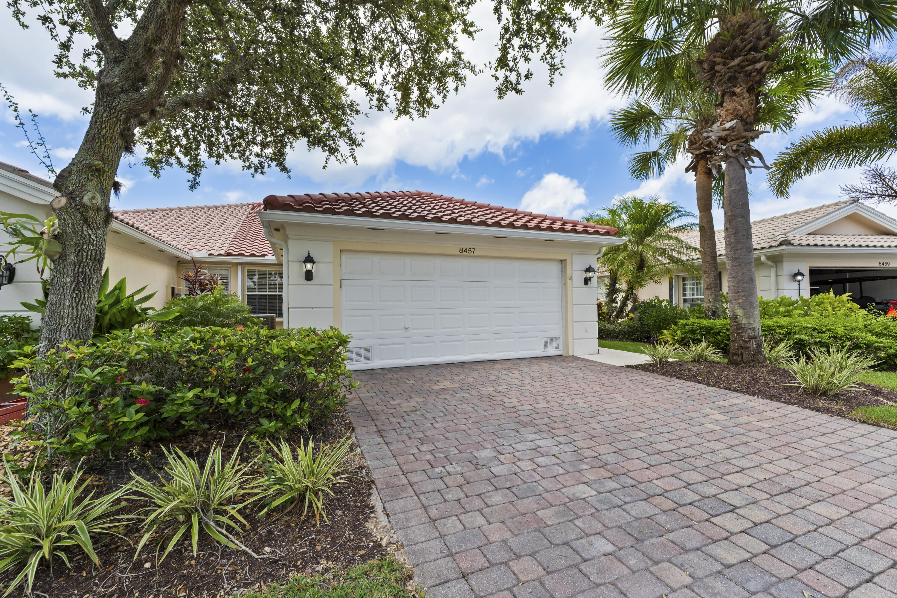 NEW TILE ROOF: Discover relaxed Florida living in this beautifully updated 2BR/2BA Divosta Capri villa with a private pool and peaceful pond view in The Retreat at Seabranch. A just-completed new tile roof with dual underlayment offers long-term peace of mind, while fresh updates create a light coastal feel throughout. Enjoy an open layout with high ceilings, new luxury vinyl plank flooring, quartz countertops, soft designer tones, poured concrete construction, full accordion shutters, and a screened lanai overlooking the pond. This turnkey villa is designed for easy indoor-outdoor living with low-maintenance comfort, all furniture is new and fully negotiable.   The Retreat offers a clubhouse, resort-style pool, tennis, pickleball, fitness center, and scenic walking paths.  Close to shops, dining, golf, and beautiful beaches, with easy access to the Palm Beaches via US-1 without needing I-95. Homes updated in The Retreat rarely become available. Schedule your showing today.
