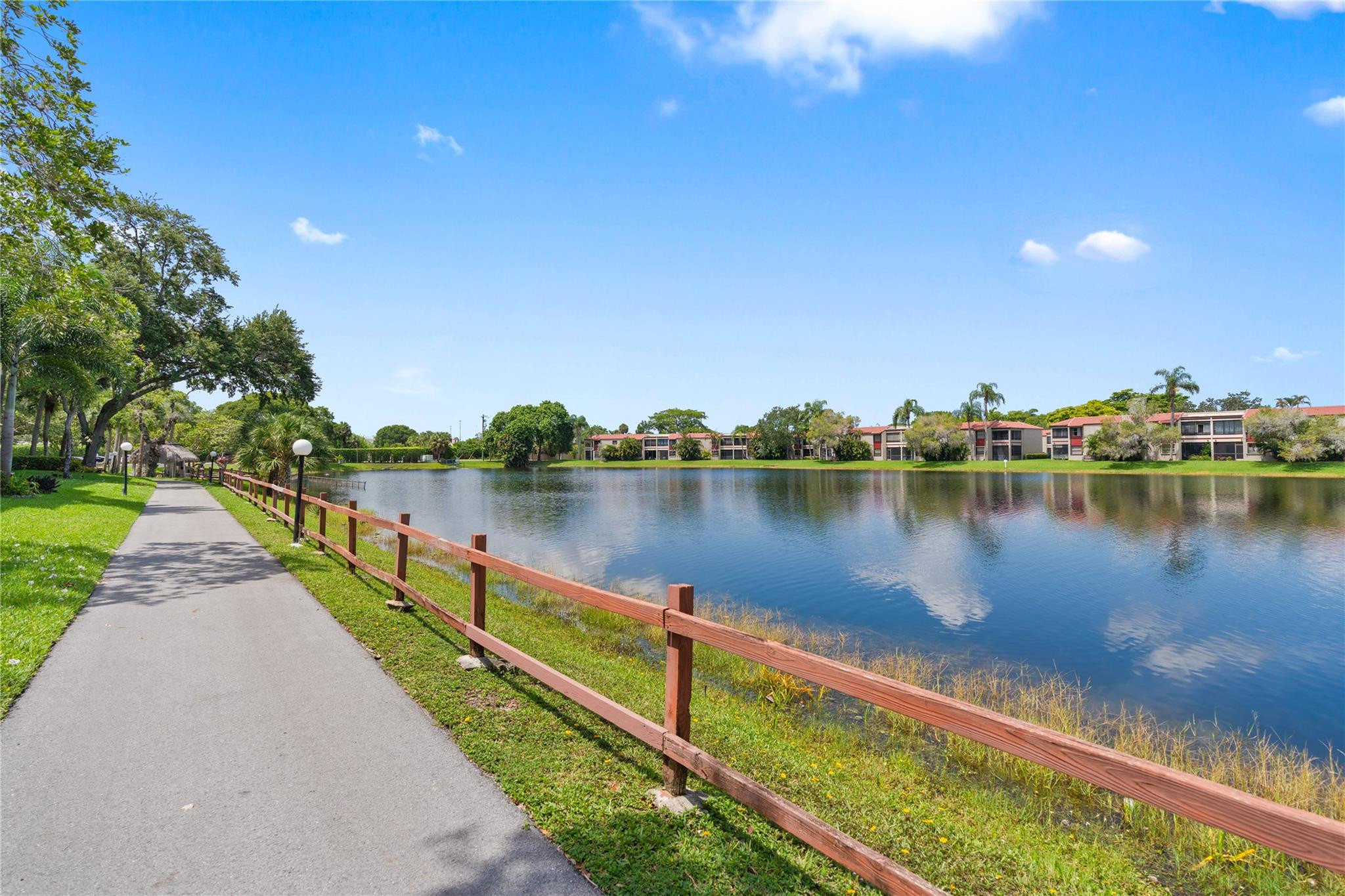 PENTHOUSE Oasis in Pembroke Pines*SPACIOUS 5th FLOOR 2 bedroom 2 bath condo in gated 55+ Colony Point*NO NEIGHBORS ABOVE*SPECTACULAR LAKE VIEWS AND SUNSETS*IMMACULATELY KEPT*SEASONALLY USED*BRIGHT and ultra convenient*Eat-in kitchen, washer and dryer in unit*LOTS OF STORAGE SPACE and storage unit*SPACE-SAVING TANKLESS WATER HEATER*Primary suite has IMPACT WINDOW, walk-in closet and private bath*Assigned parking close to elevator*Resort style living with a massive clubhouse, gym, heated pool, hot tub, tennis, movies and scenic lake paths with BBQ's*HOA includes cable, internet and 24/7 security*Prime location near guardhouse and guest parking*Rare 10% down payment allowed*Near hospitals, shopping and dining*Move-in condition*all or some furnishing can be included*