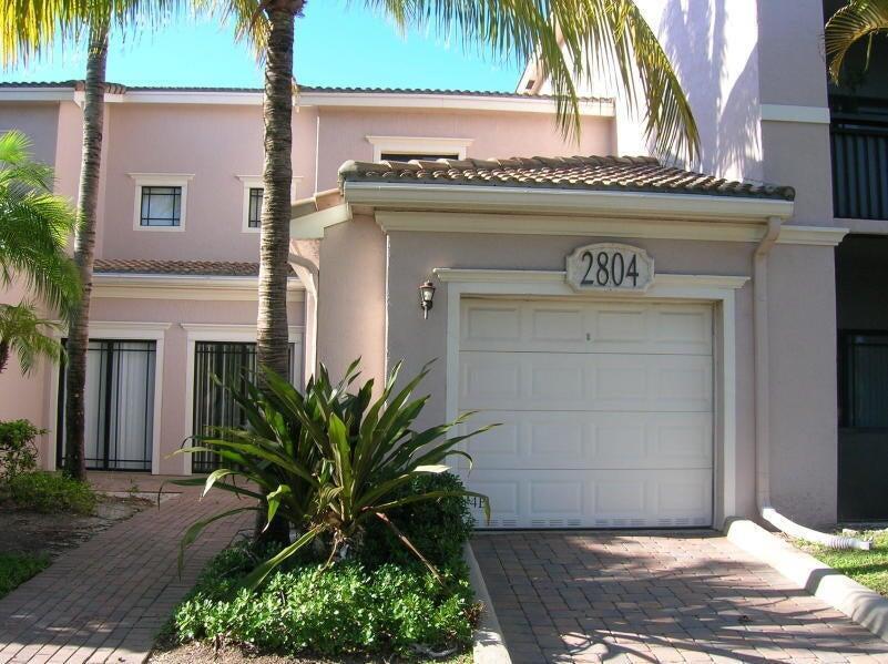 Garage Townhome in the heart of Palm Beach Gardens. Resort Style gated Community,Updated kitchen w/granite, new stainless steel applicances, new washer drying. Fresh paint, cleaned and sealed downstairs tile floor and baths, new LVPl floor upper level and stairs. Bedroom or office and one full bath down stairs, Two master suites upstairs with loft area. Impact glass throughout. Trash and Water included. Electric Car Charging station. Garage and street parking. Community pool and sauna overlooking lake, club house, new tennis and racquetball courts, business center suites. Walking distance to restuarants and shopping. 10 minutes to Juno Beach or Jupiter dog friendly beach.