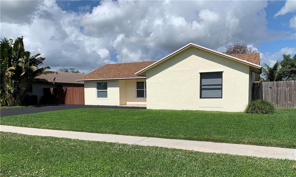 WOW... 4BDR  /2 FULL BATHROOMS HOME IN WEST BOCA WITH A/B RATED SCHOOL.  VERY LOW HOA.  OPEN LAYOUT LIVING WITH SPLIT BEDROOMS.  ROOF 2018, BEAUTIFUL AND SPACIOUS ENCLOSED SCREEN PATIO OR FL ROOM.  KITCHEN REDONE WITHIN A FEW YEARS.  MOSTLY IMPACTED GLASS WINDOWS.  DRIVEWAY CAN PARK UP TO 8 CARS.  GOOD FOR BOAT OR TRAILER PARKING.  LOTS OF TROPICAL FRUIT TREES. READY FOR MOVE IN CONDITIONGREAT LOCATION!!!  GREAT SCHOOLS ZONES.