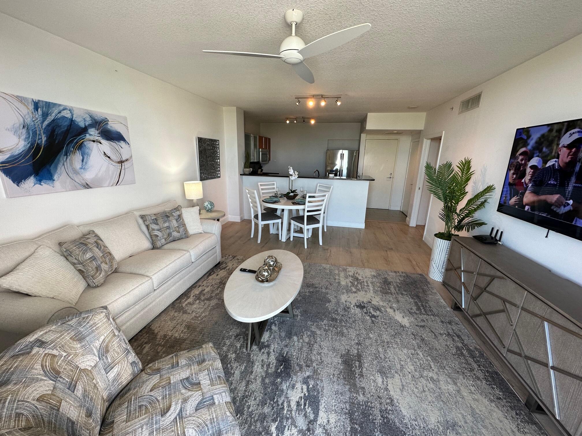 Exquisitely ''furnished rental'' is newly decorated with the latest trends in design for today's contemporary lifestyle.This gorgeous condo features a pull out sofa in the living room for your occasional overnight guests, a new 65'' wall mounted smart tv, King size bed, and a 55'' wall mounted TV.. Full size front loading washer/dryer. Large balcony to enjoy incredible sunset views. The Slade amenities include, two infinity pools, club room, fitness center, sauna, valet parking, secure garage parking and 24-hour lobby attendant. Conveniently located just across the bridge to Palm Beach, restaurants, shopping and minutes to downtown and all transportation.