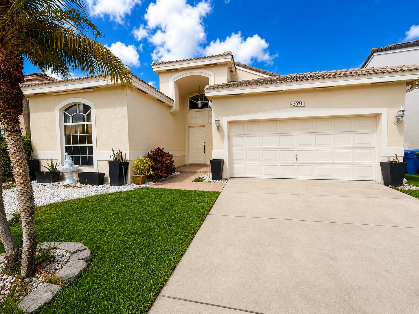 This beautifully updated 3-bedroom, 2-bath  home is set on a unique, quiet lot in a sought-after neighborhood. Tucked away on a quiet street lined with mature trees, this property blends comfort, style, and open space and floor plan with high ceilings.A new barrel tile roof 2024  and HVAC replaced in 2026 for added value. With its prime location and resort-style amenities, this home offers a rare opportunity to enjoy both privacy and convenience in an exceptional setting. The home is just a few minutes from a large park with a playground, basketball courts and walking paths, doggie park and more, walking distance to a community pool perfect for families. Hoa fee is $186.00 / monthly and a $99.00 twice a year