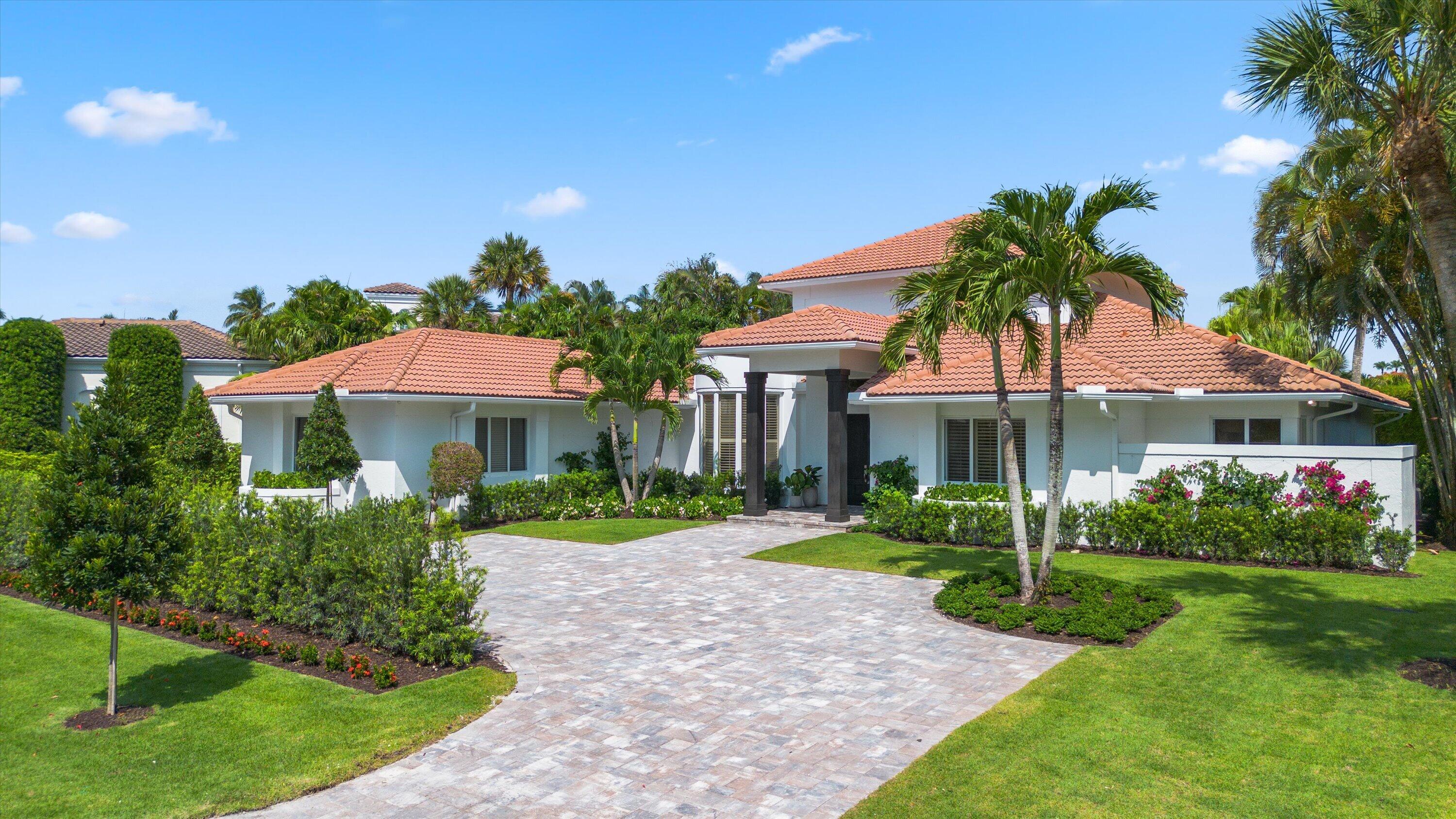 Set within the Golf Brook neighborhood of Palm Beach Polo & Country Club, this completely reimagined residence offers refined single-story living across just under 4,000 square feet. Featuring 4 bedrooms and 5 full bathrooms, the home balances clean design with comfortable, well-scaled living spaces and an effortless connection between indoor and outdoor living.  Overlooking exceptional water views, the outdoor setting is designed for both entertaining and everyday enjoyment, complete with a resort-style pool, full summer kitchen, and cabana bath. Additional features include wood floors throughout, impact windows and doors, and a whole-home generator. A rare opportunity to own a fully transformed residence in the heart of Palm Beach Polo.